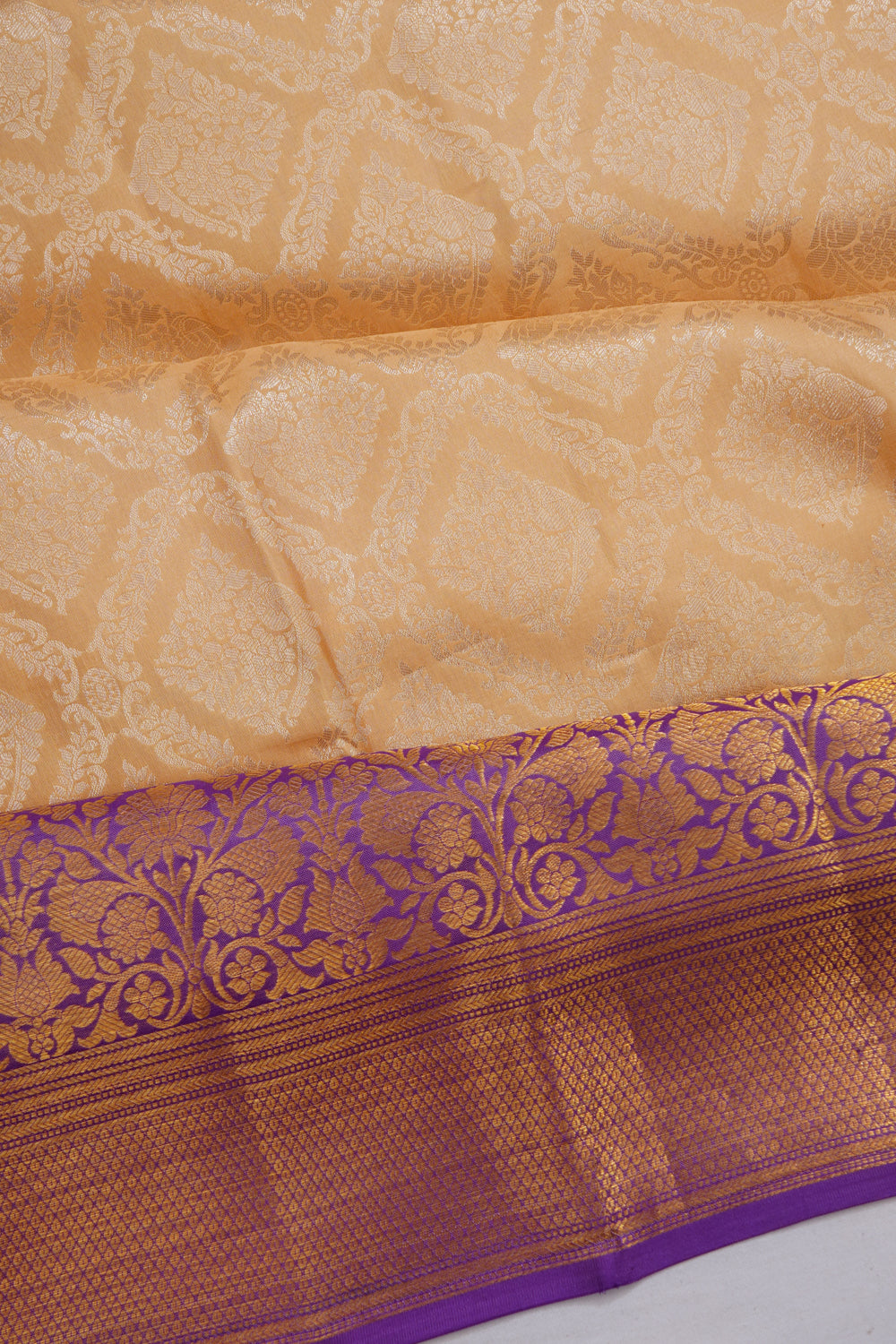 Taranga Kanchi Silk Tissue Brocade Gold Saree