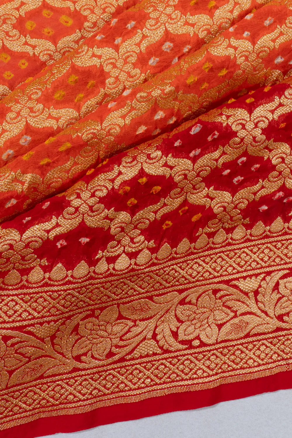 Banarasi Georgette Bandhani Brocade Dual Tone Red And Orange Saree