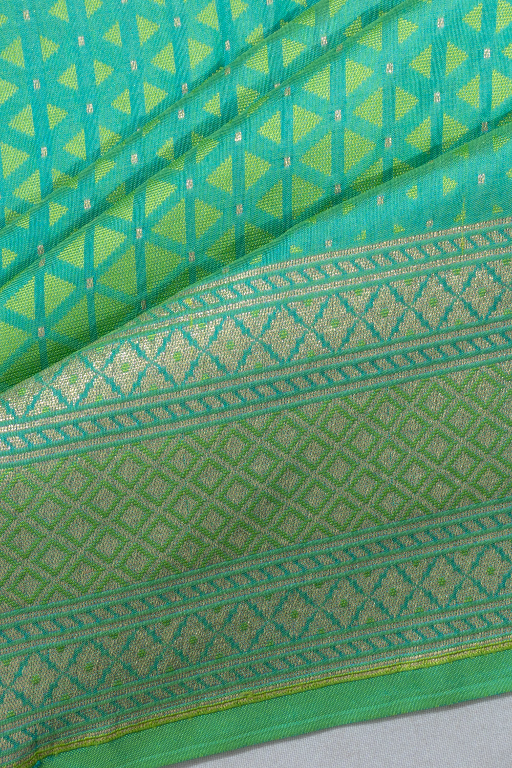Banarasi Silk Geometrical Brocade Green Saree