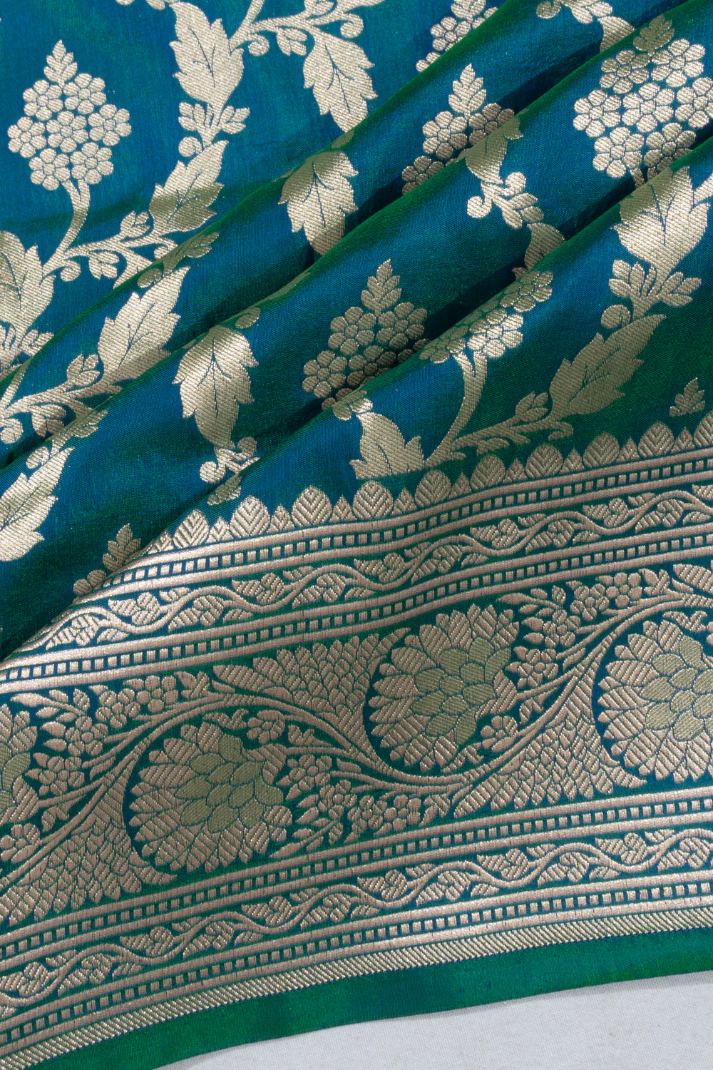 Banarasi Silk Jaal Dual Tone Blue And Green Saree