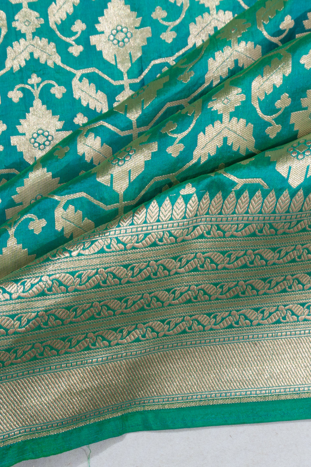Banarasi Silk Geometric Brocade Dual Tone Green And Blue Saree
