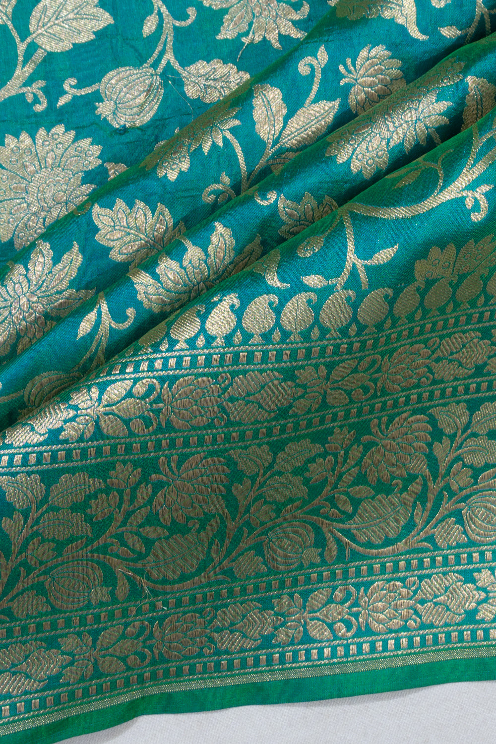 Banarasi Silk Jaal Dual Tone Green And Blue Saree