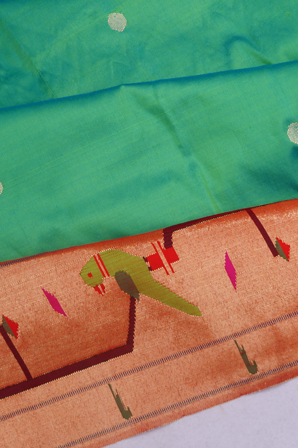 Paithani Silk Butta Pastel Green Saree With Akruthi Border