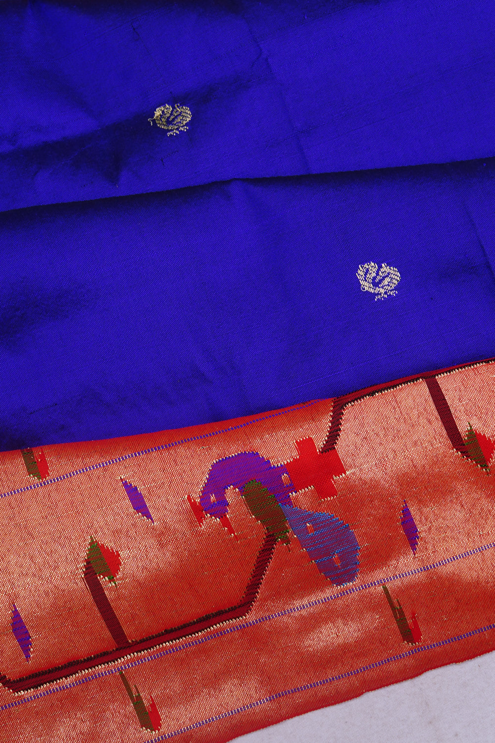 Paithani Silk Butta Royal Blue Saree With Akruthi Border