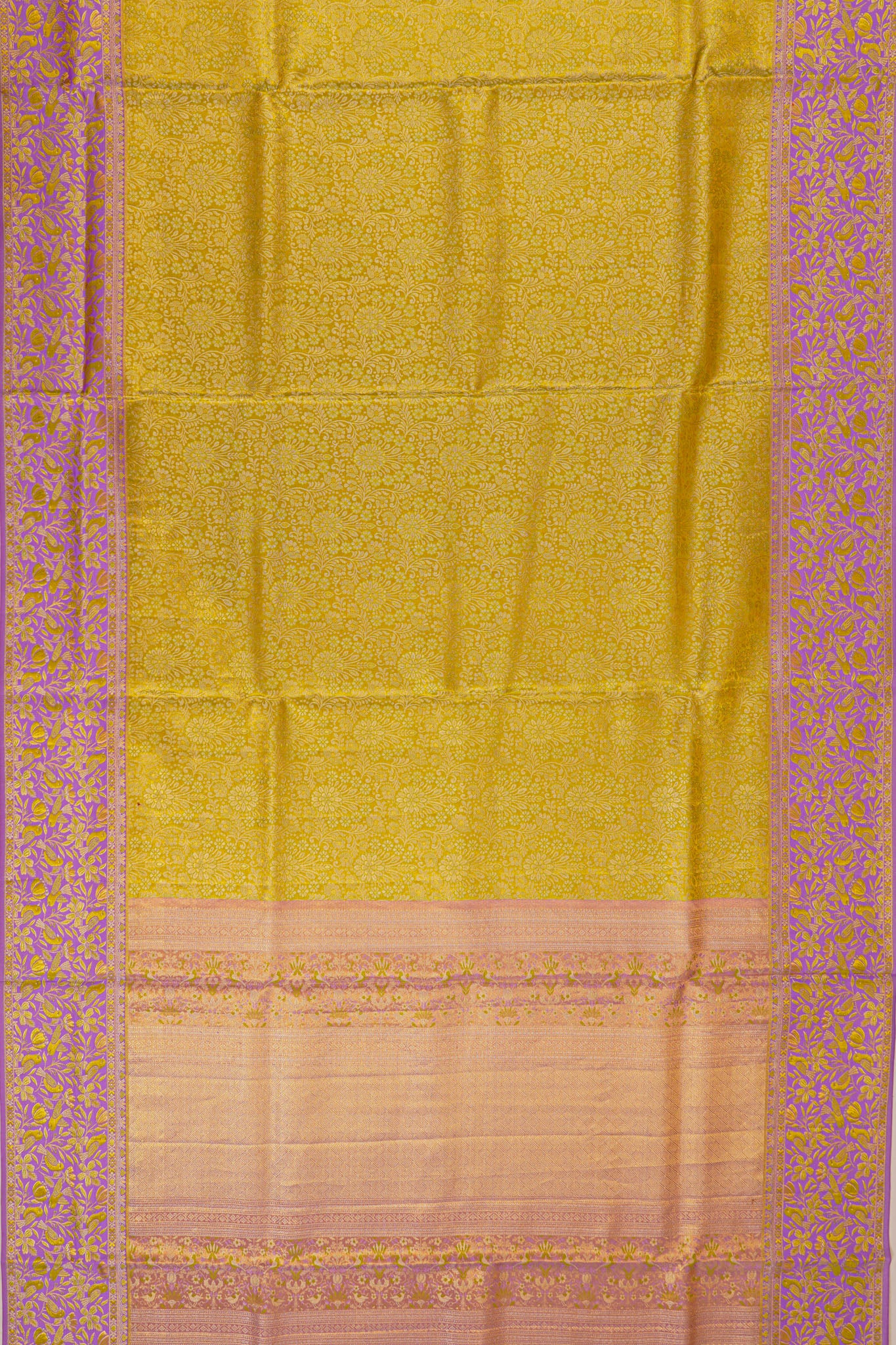 Taranga Kanchi Silk Tissue Brocade Green Saree