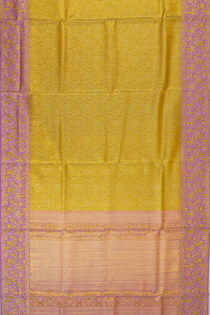 Taranga Kanchi Silk Tissue Brocade Green Saree