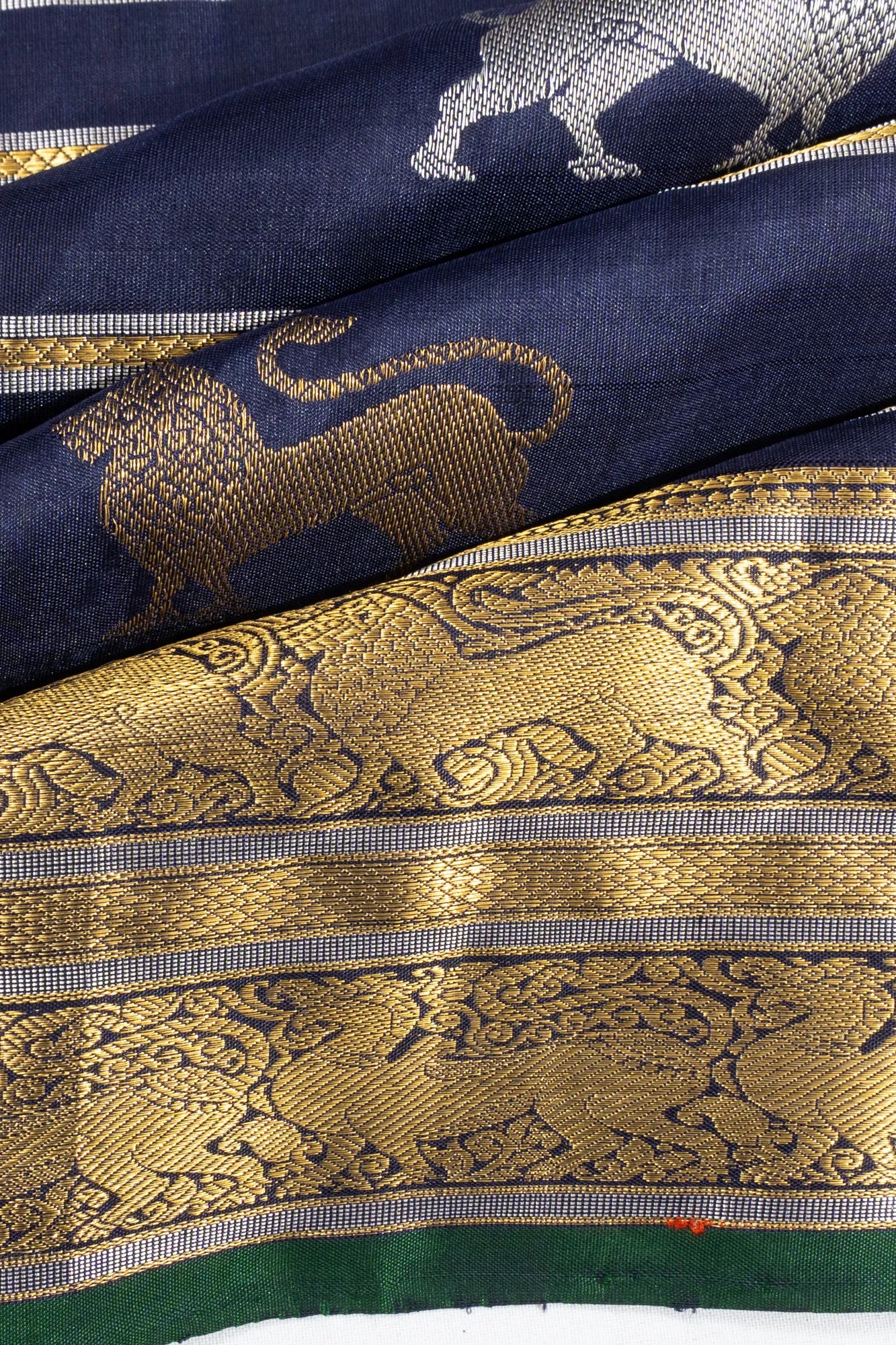 Classic Kanchipuram Silk Lines Brocade And Lion Butta Dark Blue Saree
