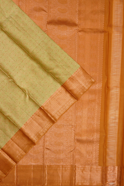 Taranga Kanchi Silk Tissue Brocade Green Saree