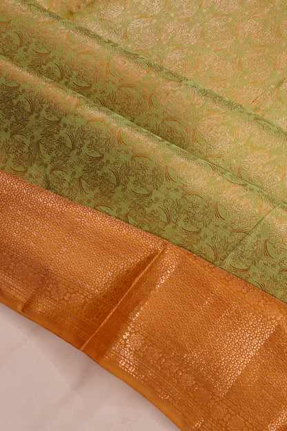 Taranga Kanchi Silk Tissue Brocade Green Saree