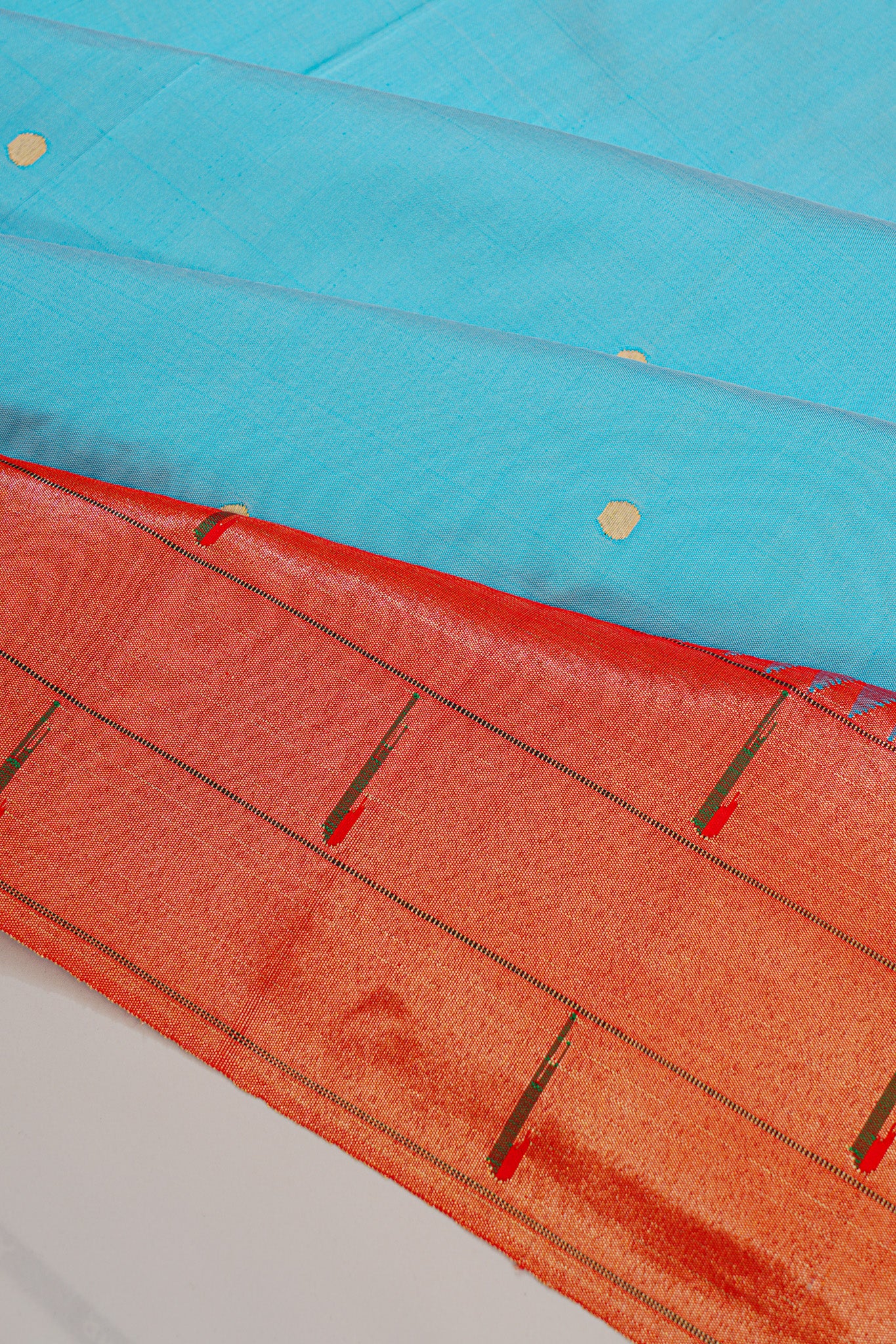 Paithani Silk Butta Sky Blue Saree With Triple Muniya Border