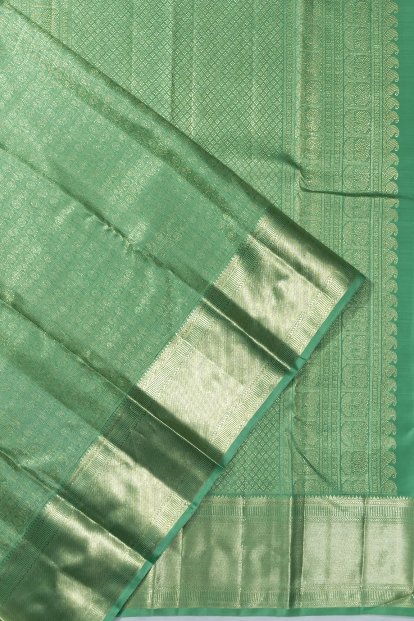 Kanchipuram Silk Checks And Butta Green Saree