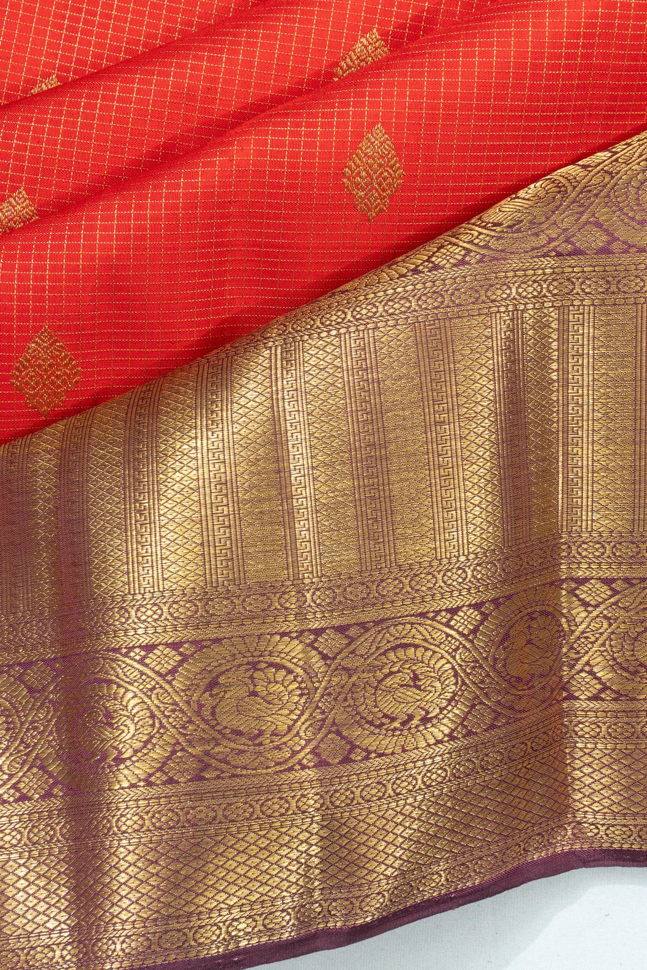 Kanchipuram Silk Checks And Butta Orange Saree