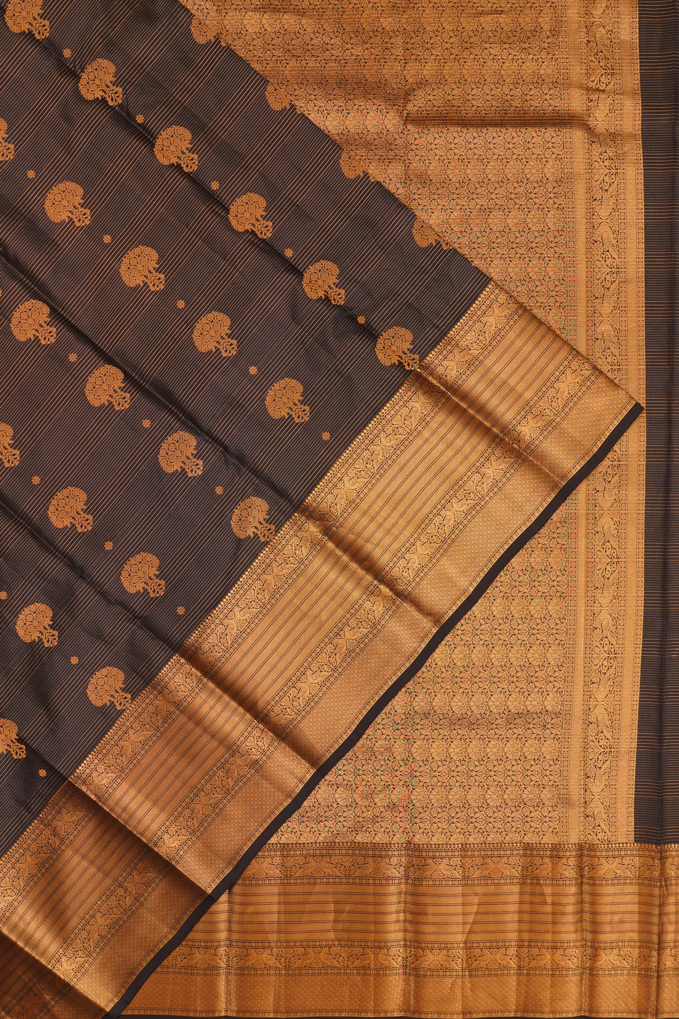 Taranga Kanchi Silk Oosi Lines And Butta Black Saree