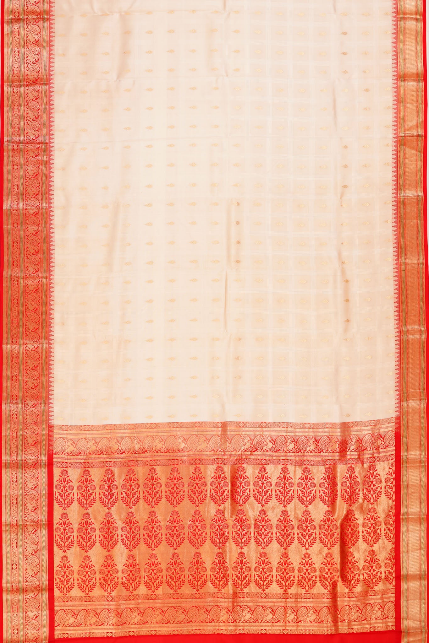 Taranga Kanchi Silk Checks And Butta Off White Saree