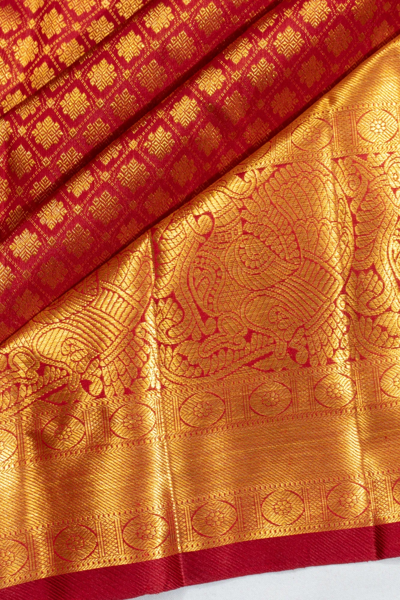 Kanchipuram Silk Criss Cross Checks And Butta Maroon Saree