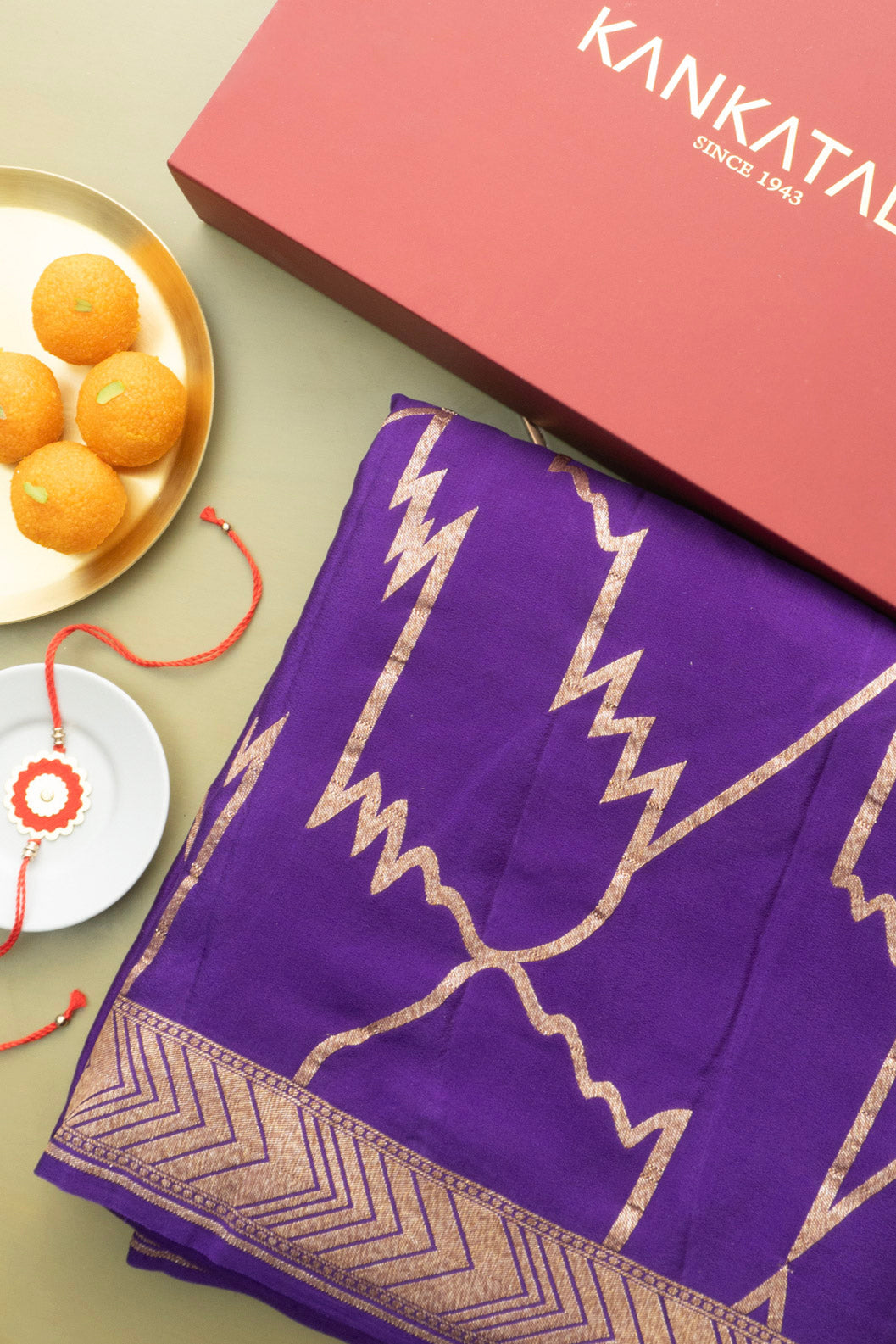 Georgette Geometrical Jaal Purple Saree WIth Rakhi