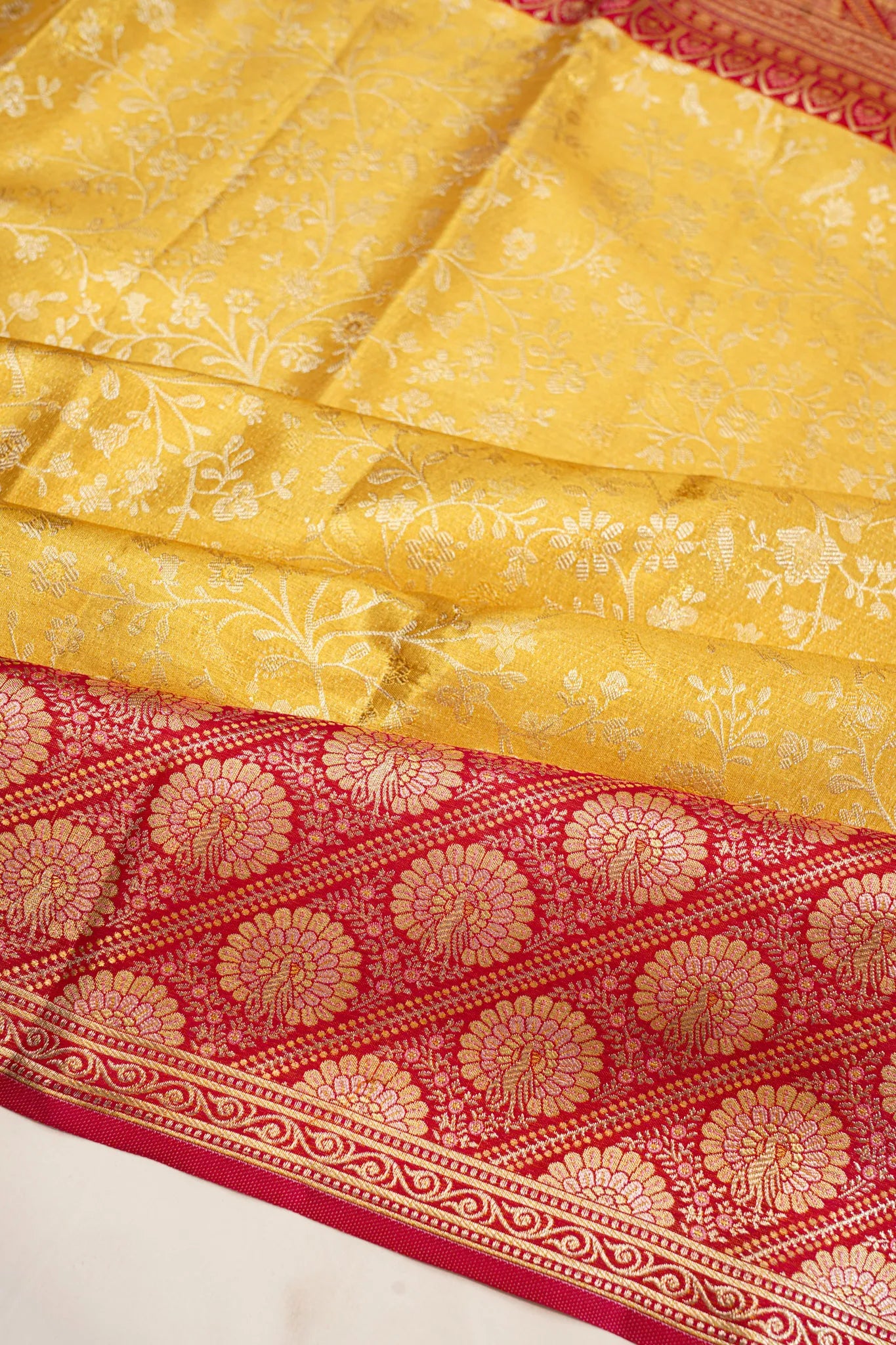 Taranga Kanchi Silk Tissue Brocade Gold Saree