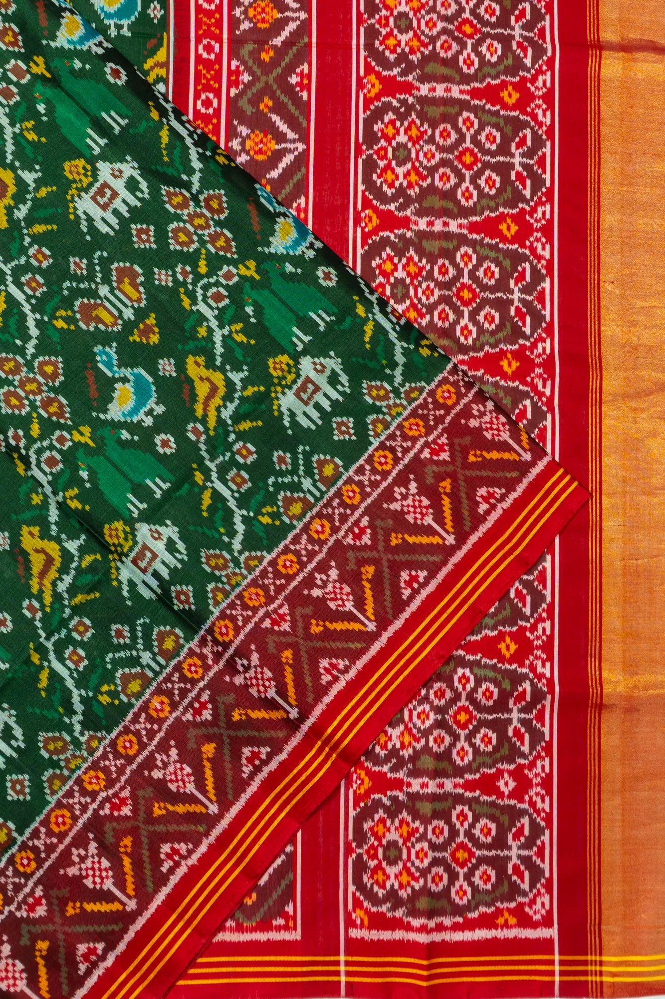 Semi Patan Patola Silk Ikat Dark Green Saree