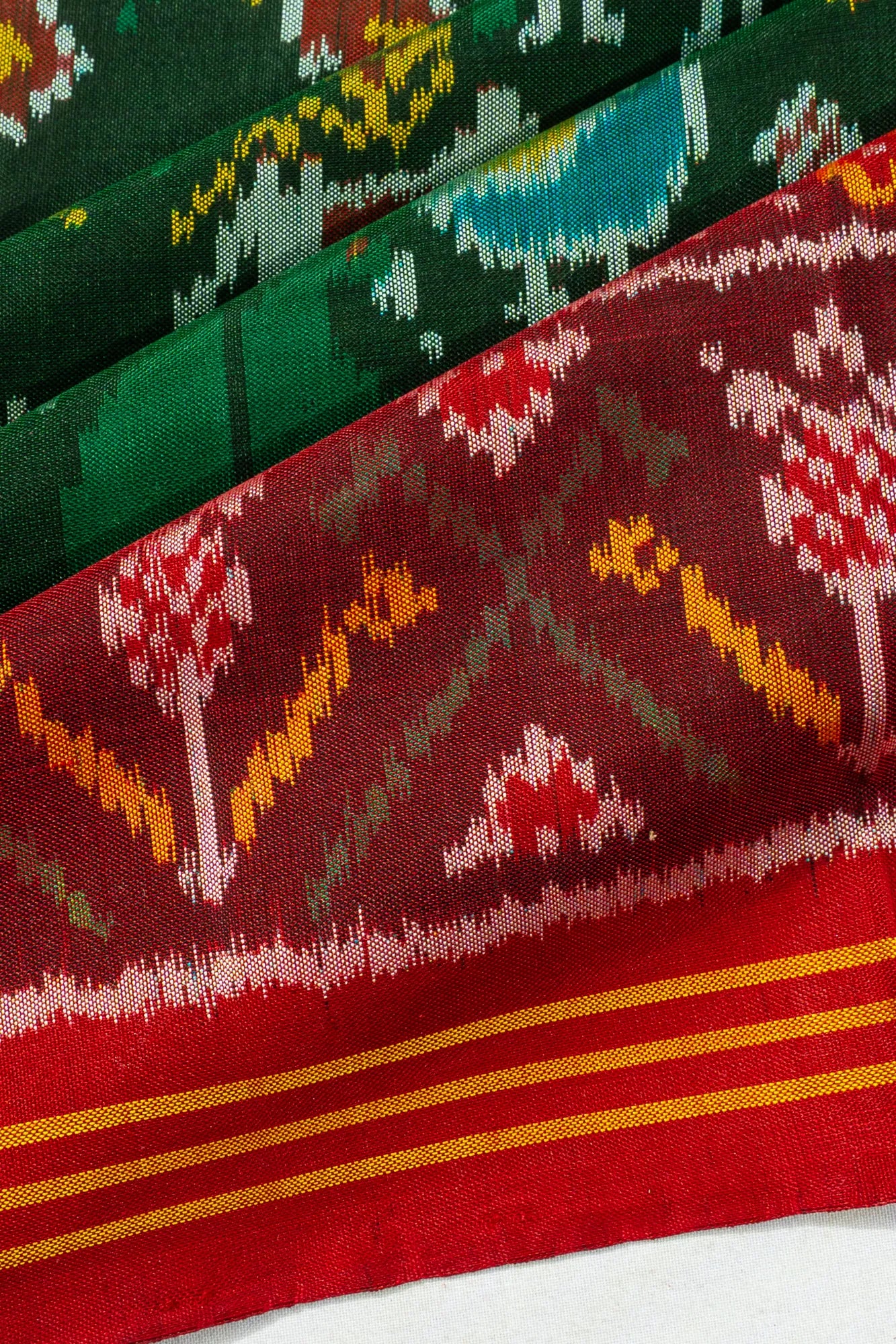 Semi Patan Patola Silk Ikat Dark Green Saree