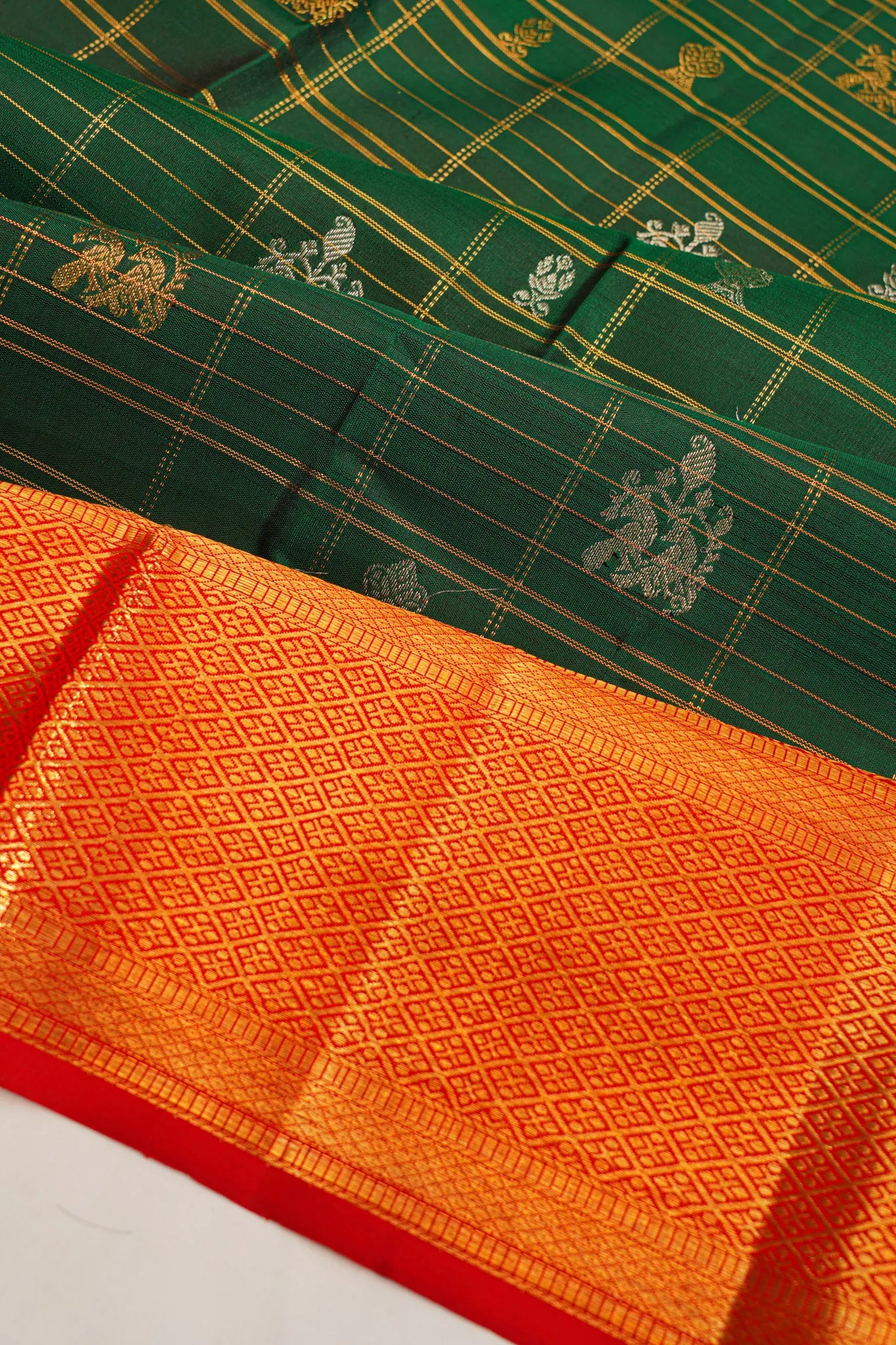 Kanchipuram Silk Checks And Butta Bottle Green Saree