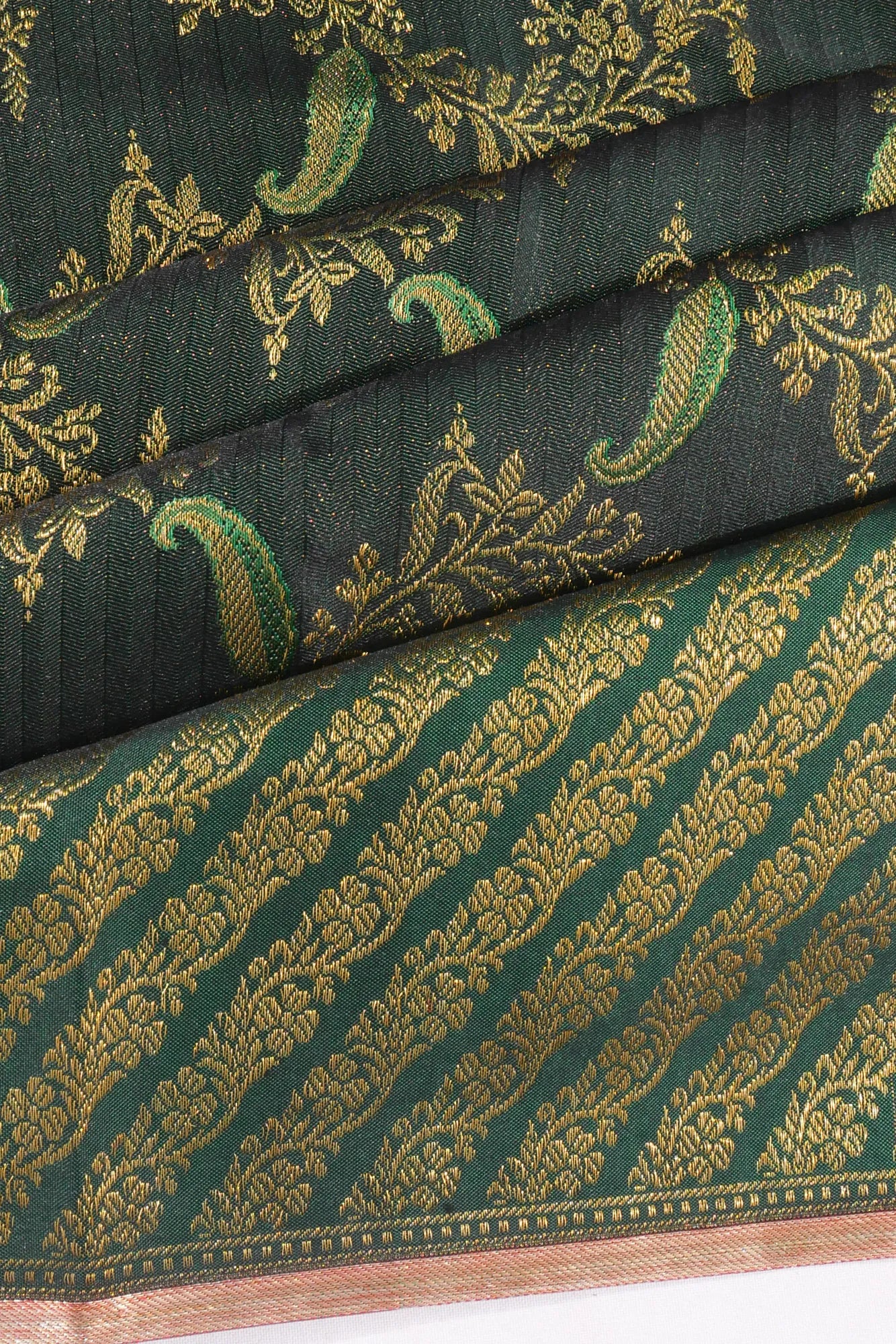 Taranga Kanchi Silk Jaal Dark Green Saree