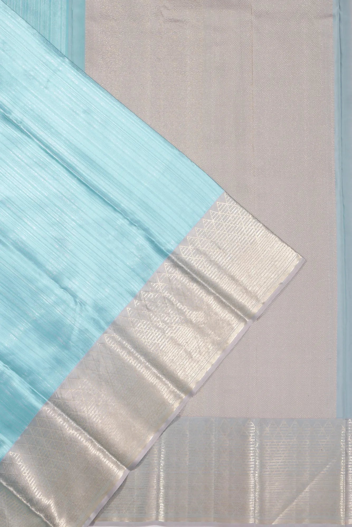 Taranga Kanchi Silk Tissue Vertical Lines Sky Blue Saree