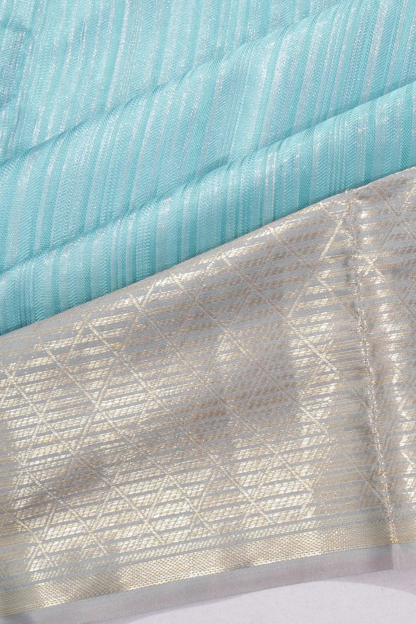 Taranga Kanchi Silk Tissue Vertical Lines Sky Blue Saree