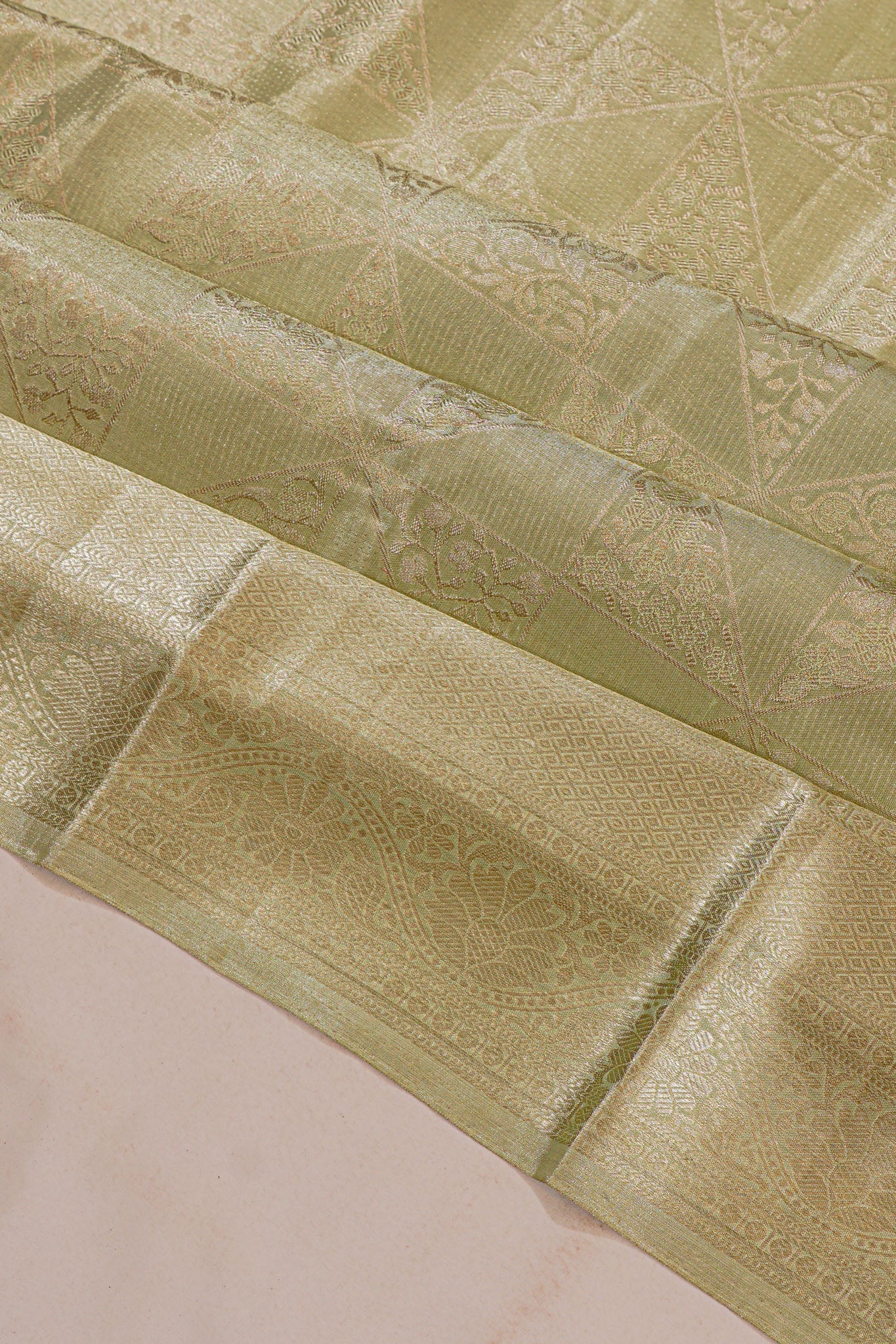 Taranga Kanchi Silk Tissue Brocade Pastel Green Saree