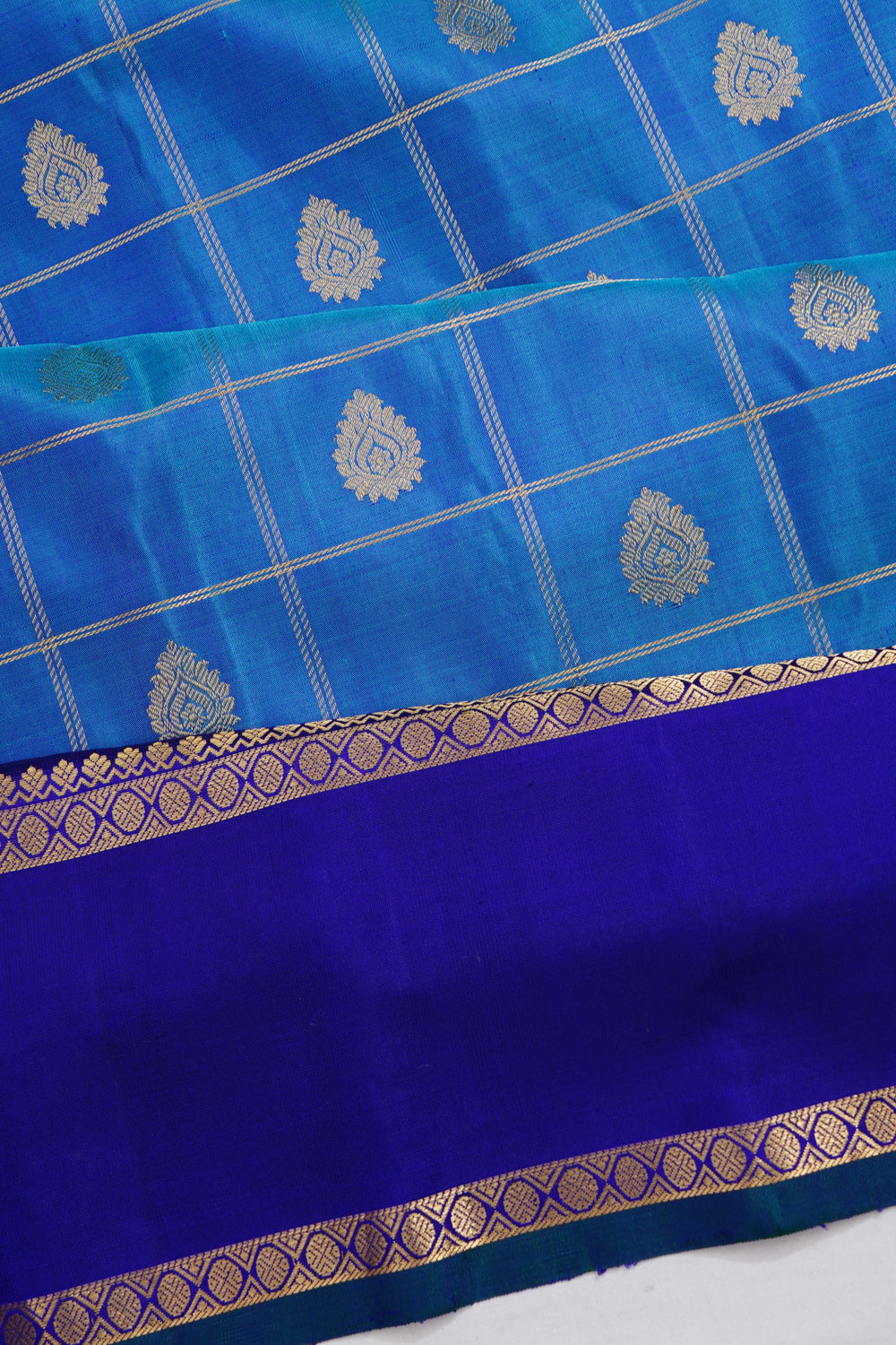 Gadwal Silk Checks And Butta Sky Blue Saree