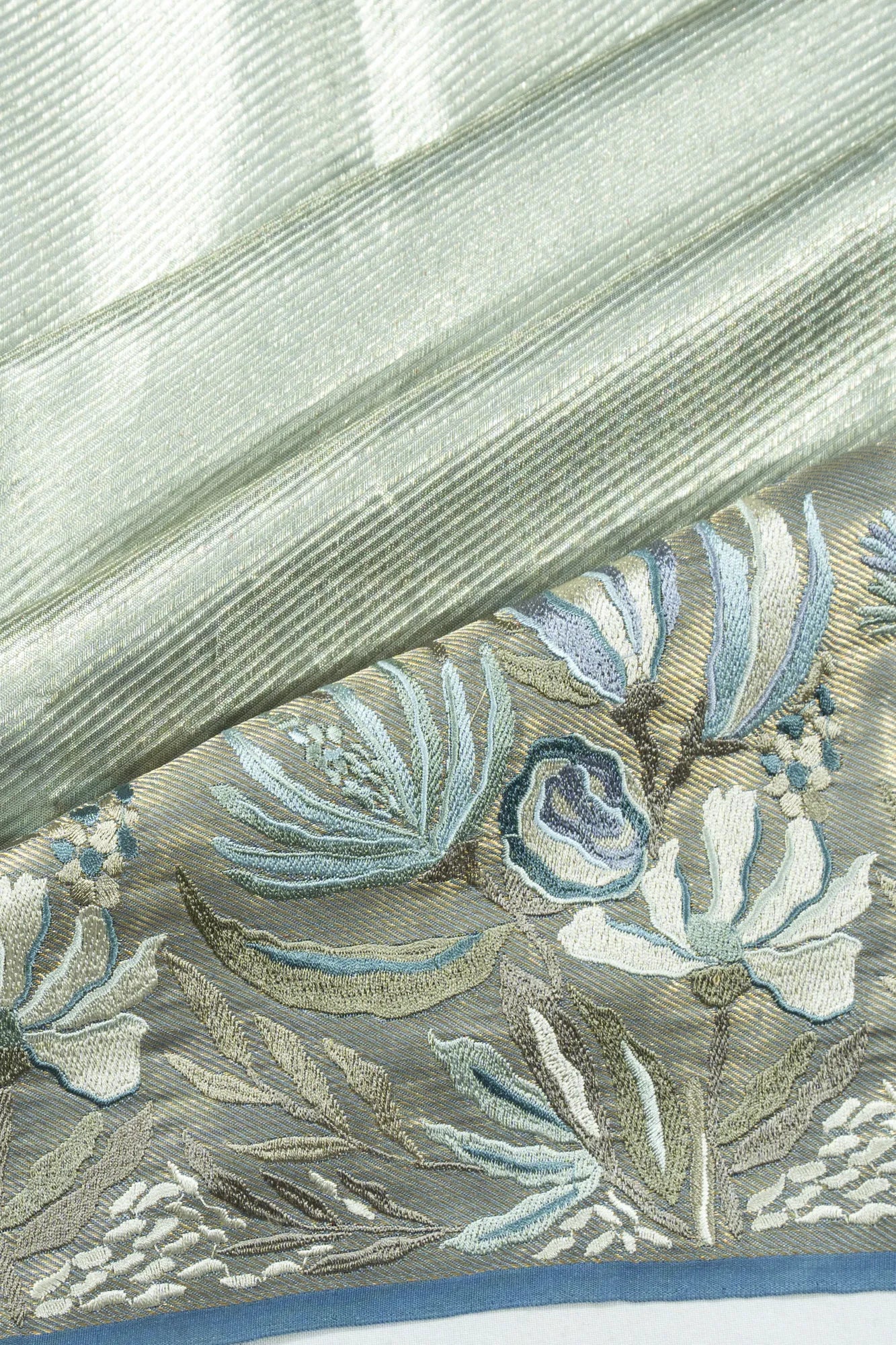 Kanchipuram Silk Tissue Diagonal Lines Pastel Blue Saree With Embroidery Border