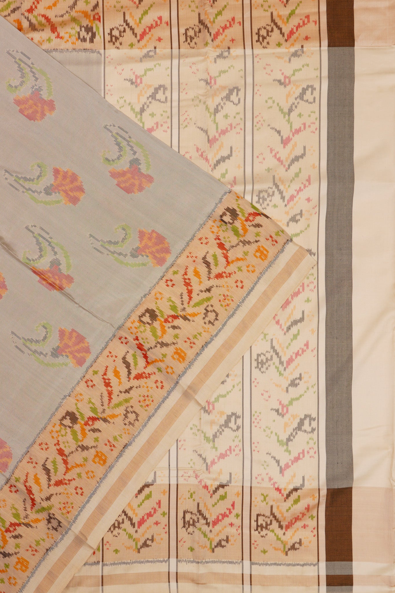 Semi Patan Silk Ikat Butta Grey Saree