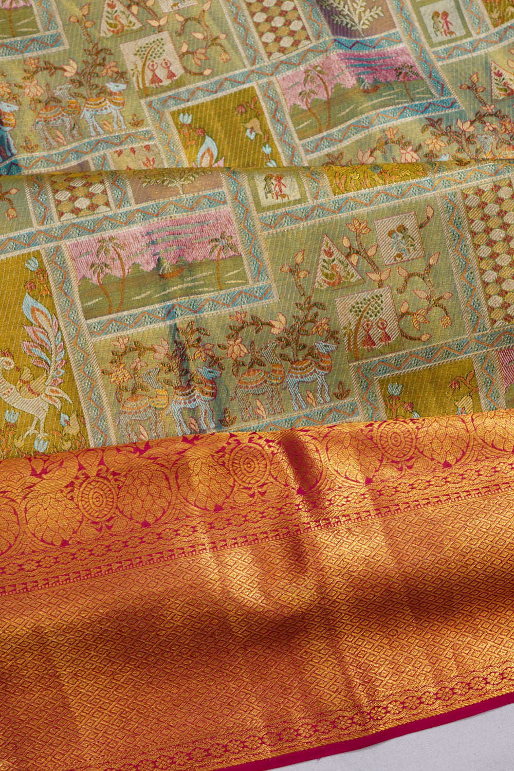 Taranga Kanchi Silk Tissue Brocade Green Saree