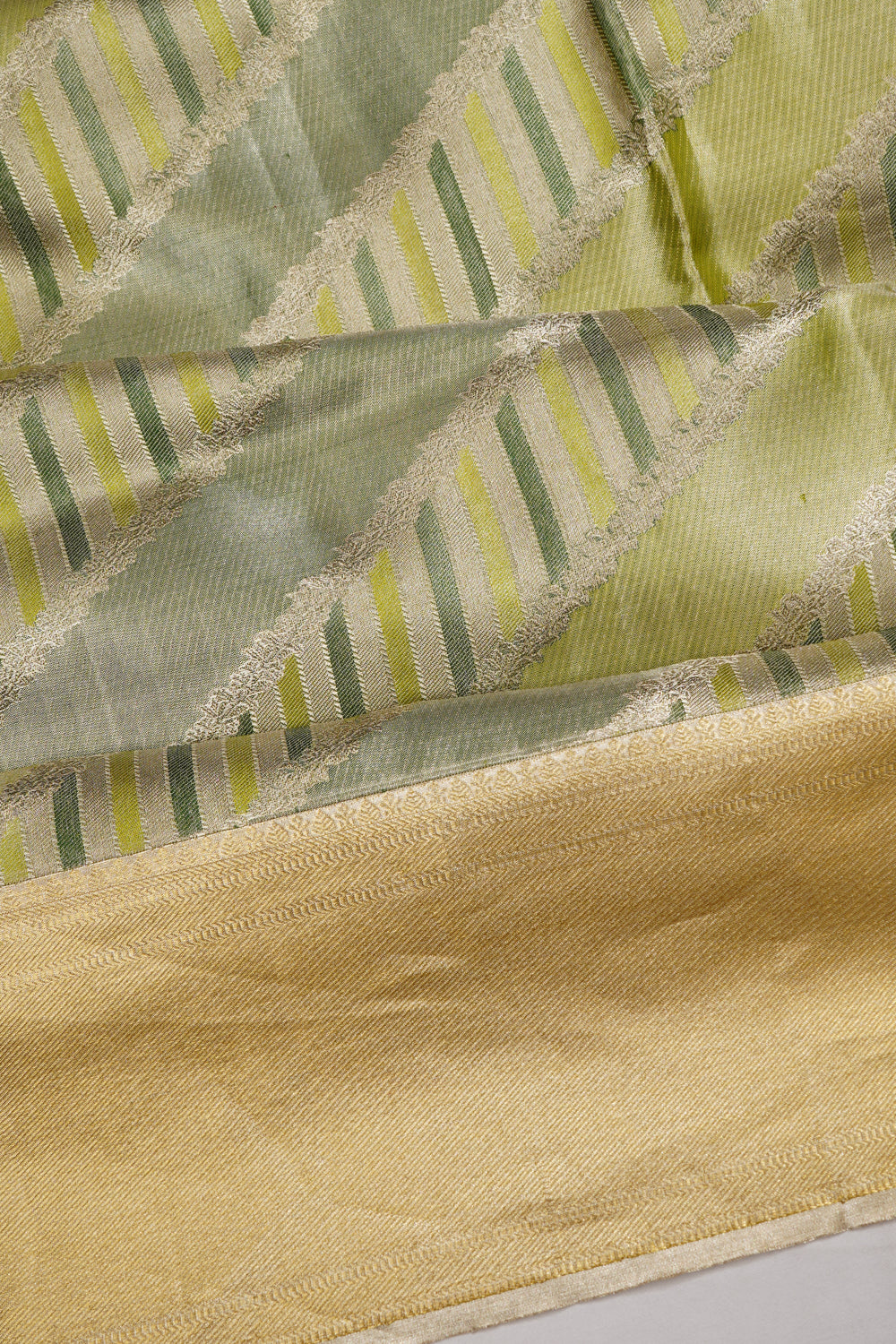 Taranga Kanchi Silk Tissue Brocade Green Saree