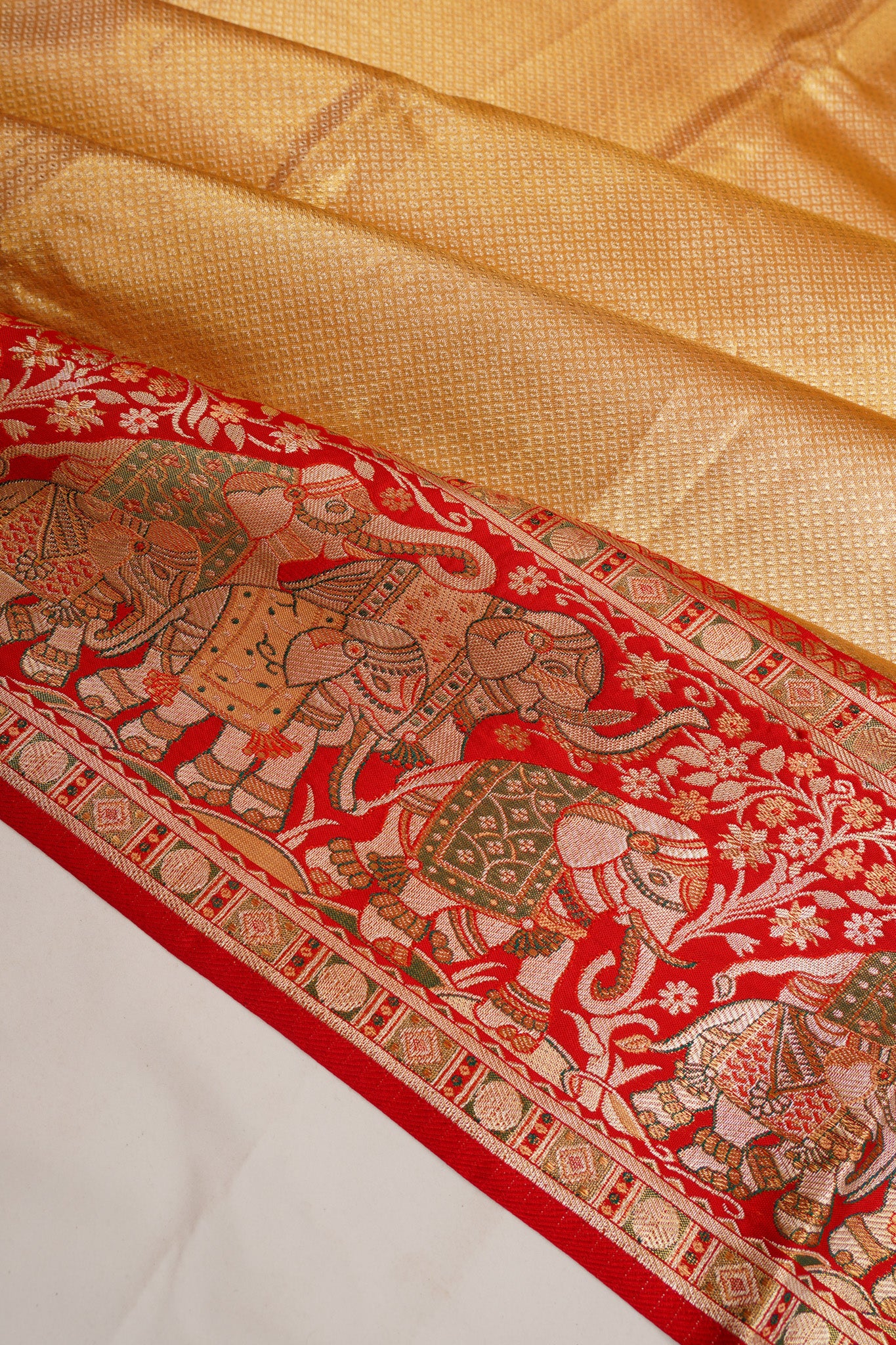 Taranga Kanchi Silk Tissue Brocade Gold Saree