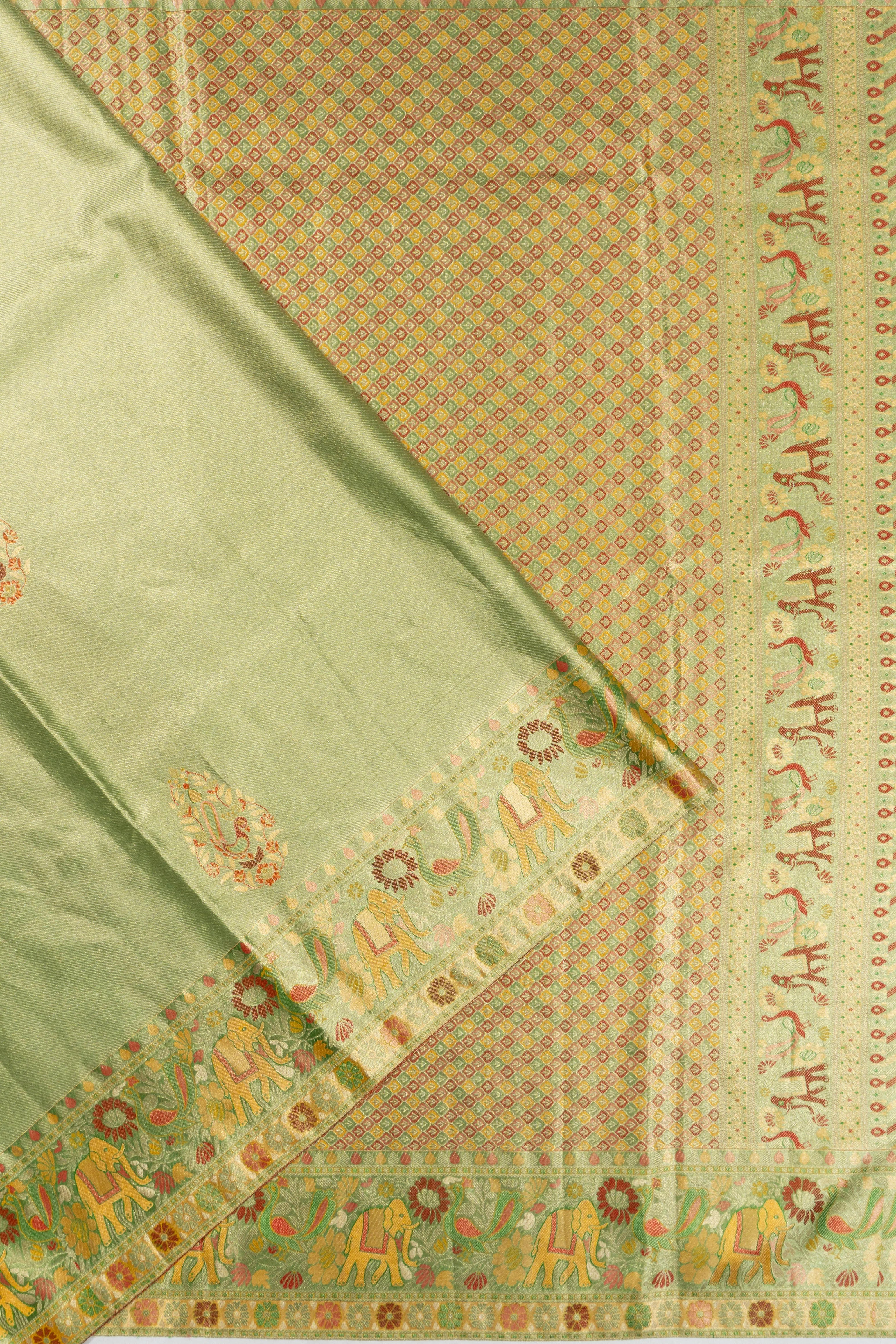 Taranga Kanchi Silk Tissue Butta Pastel Green Saree