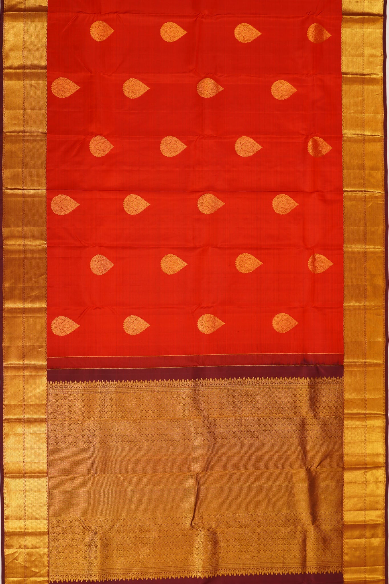 Taranga Kanchi Silk Butta Rust Orange Saree