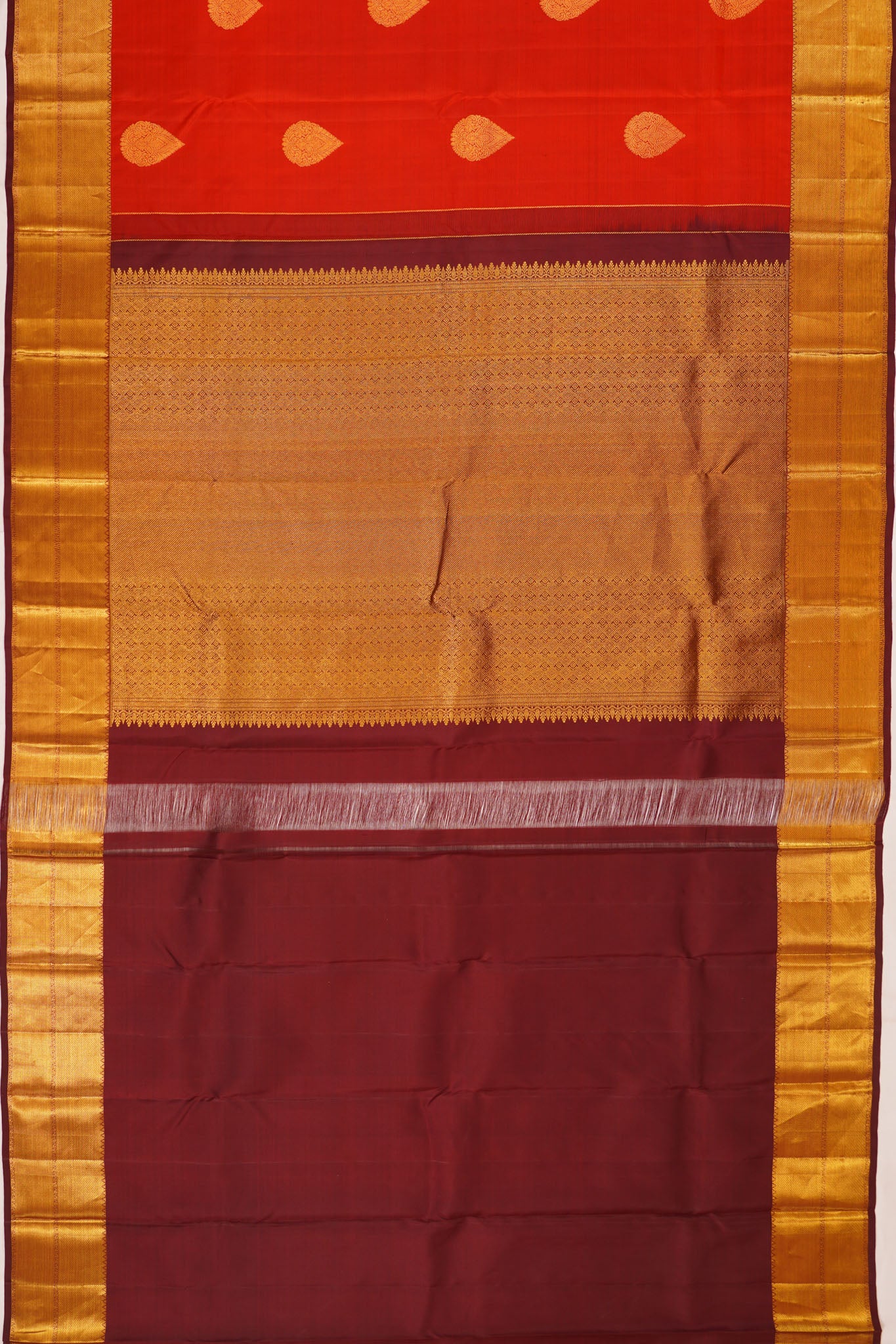 Taranga Kanchi Silk Butta Rust Orange Saree