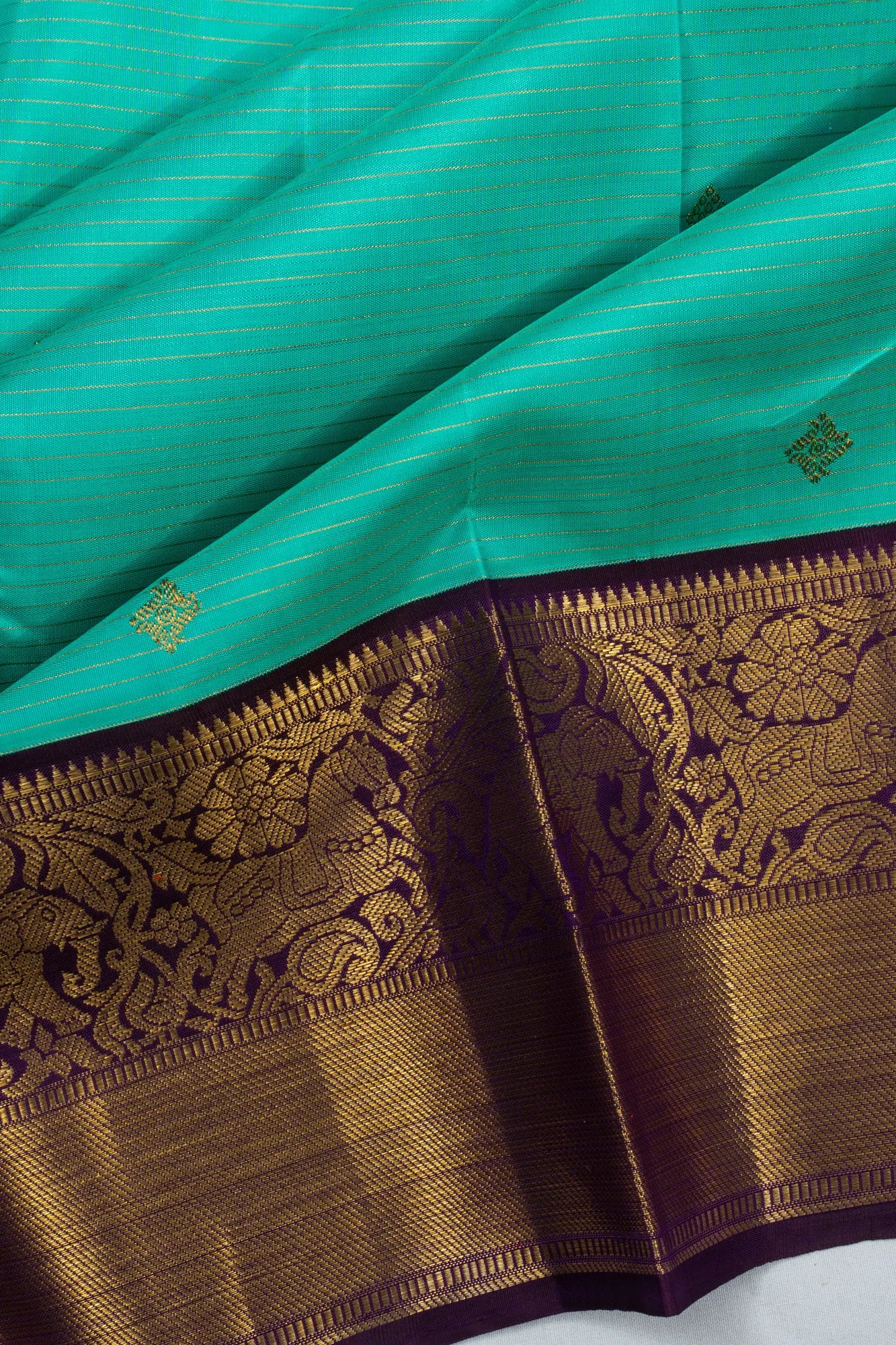 Kanchipuram Silk Checks And Butta Sea Green Saree
