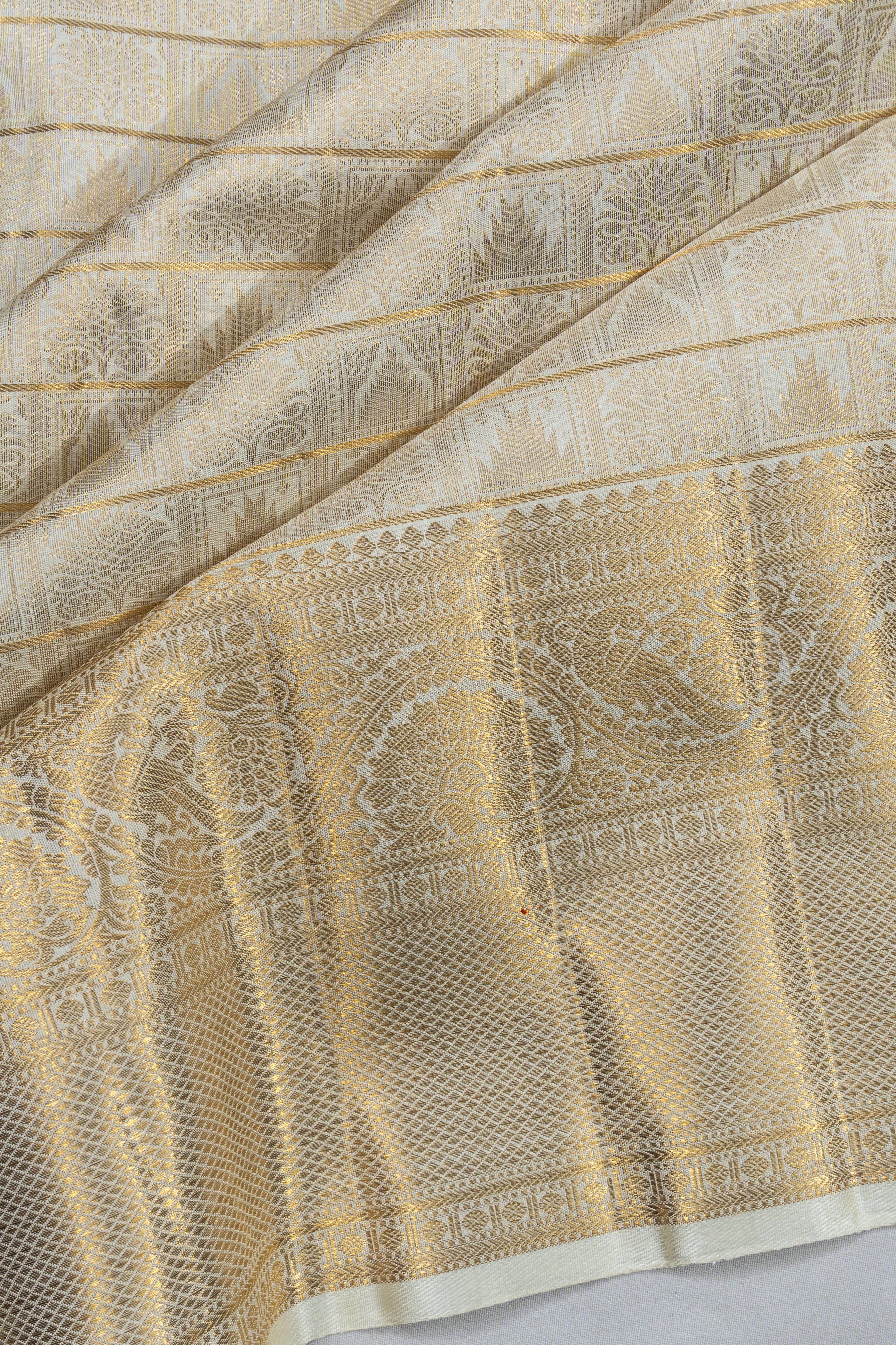 Kanchipuram Silk Tissue Checks And Butta Off White Saree