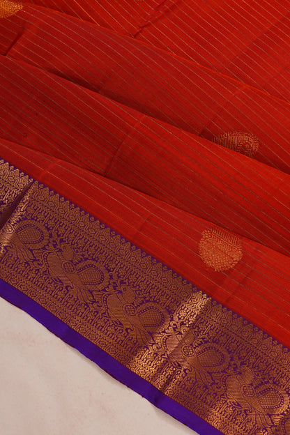 Taranga Kanchi Silk Oosi Lines And Butta Rust Orange Saree