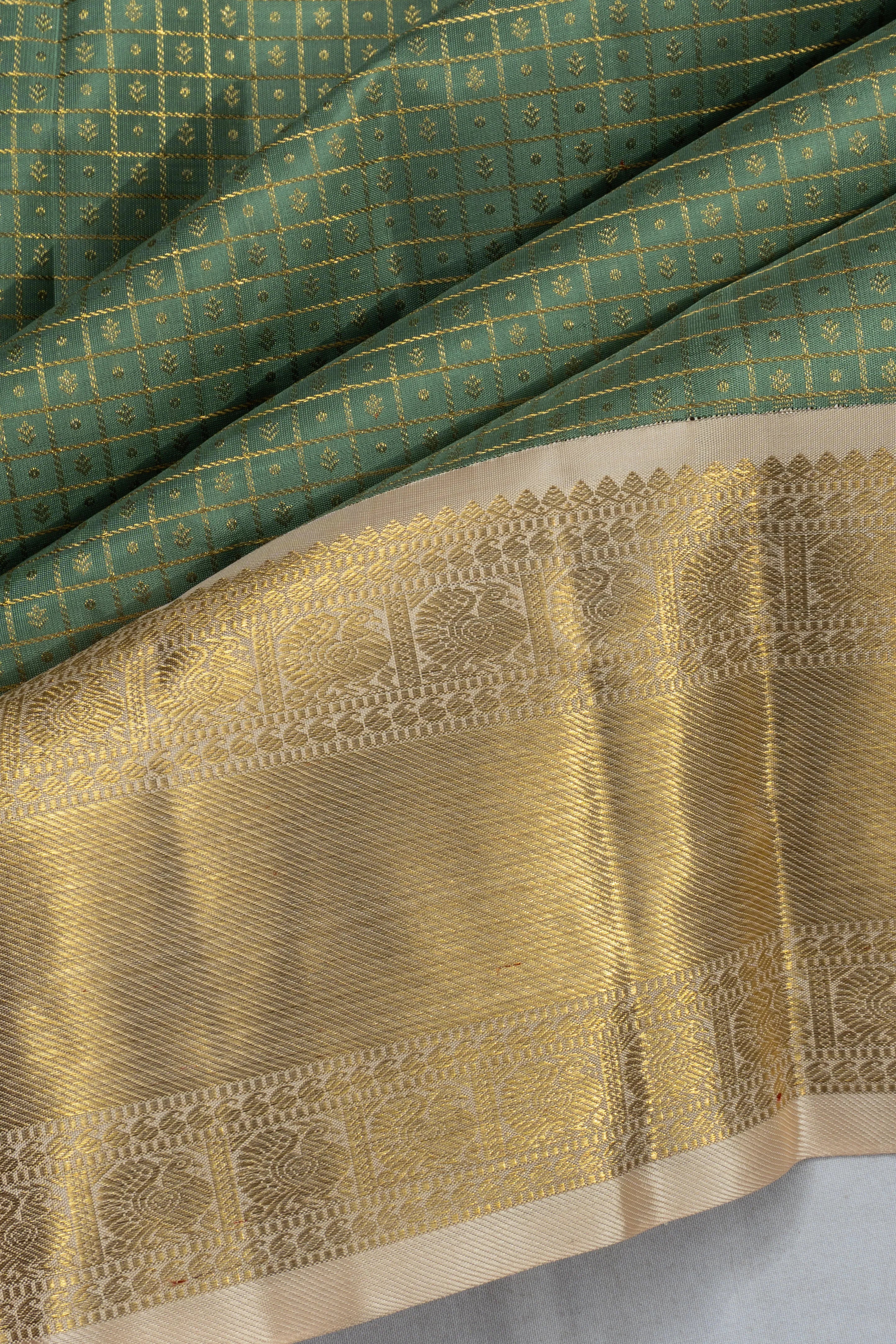 Kanchipuram Silk Checks And Butta Green Saree