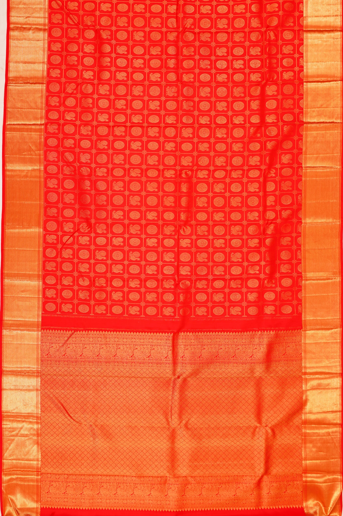 Taranga Kanchi Silk Checks And Butta Red Saree