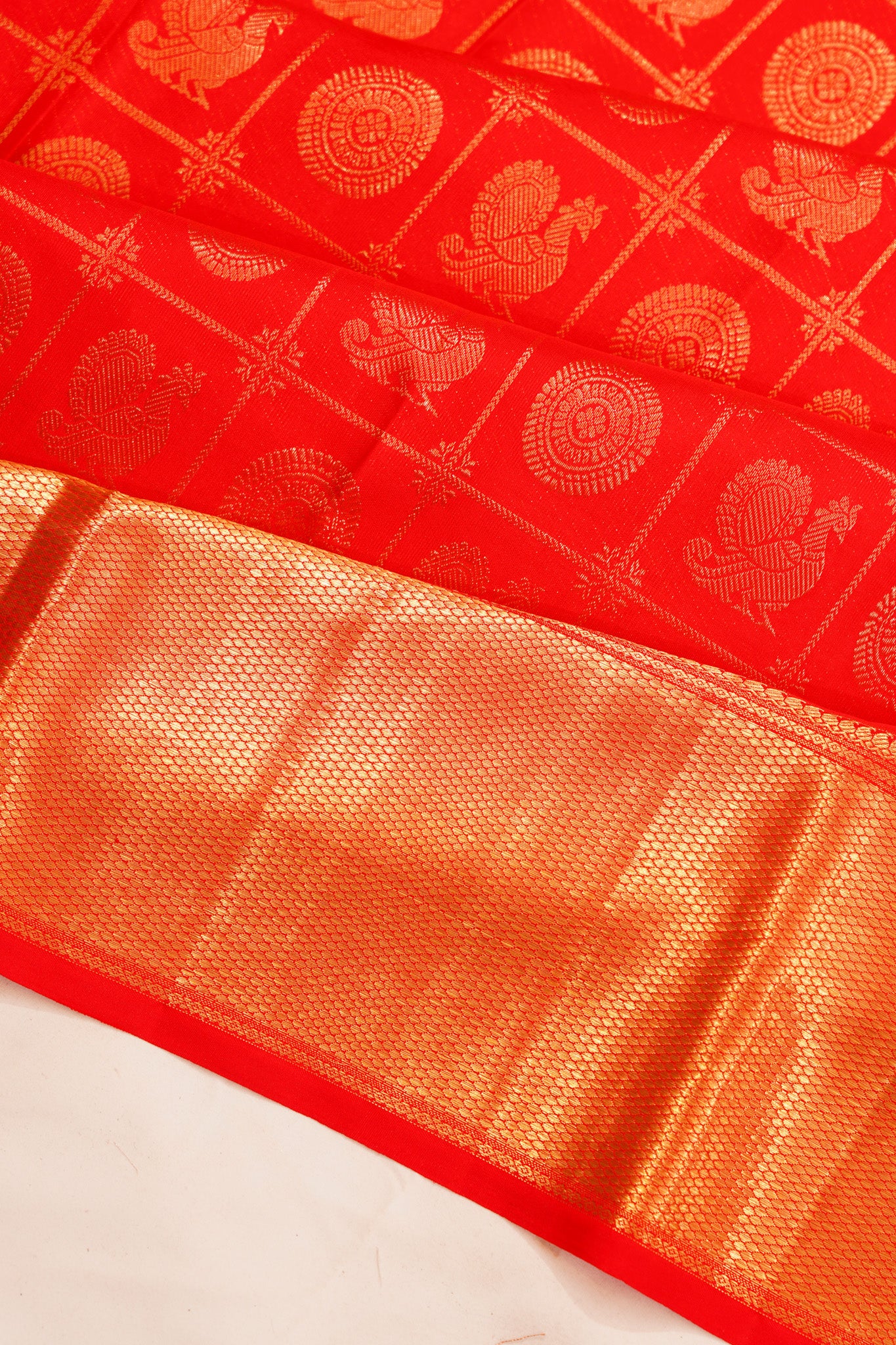 Taranga Kanchi Silk Checks And Butta Red Saree