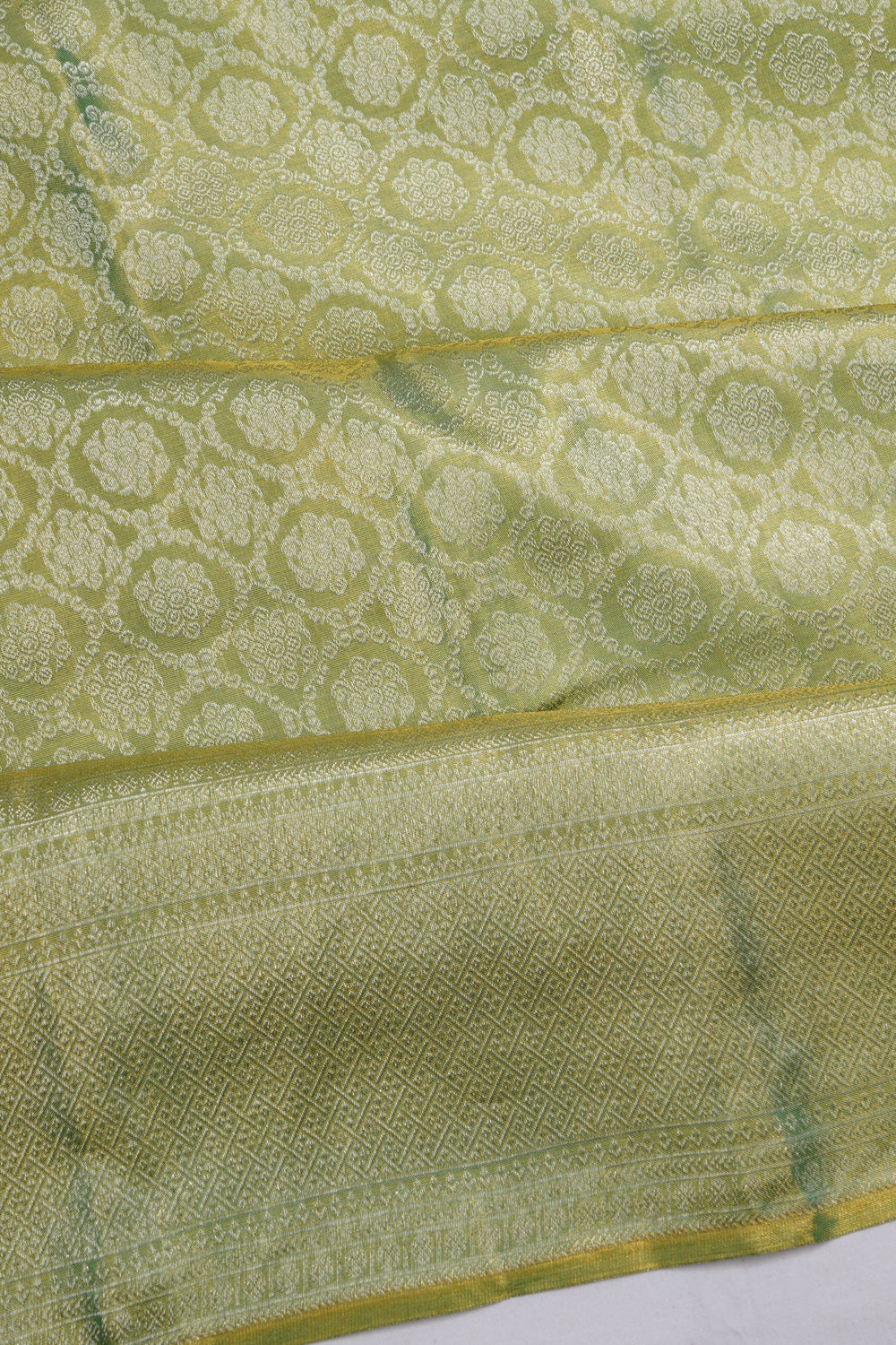 Taranga Kanchi Silk Tissue Brocade Green Saree