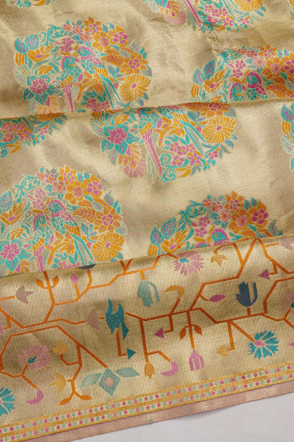 Taranga Kanchi Silk Tissue Brocade Gold Saree