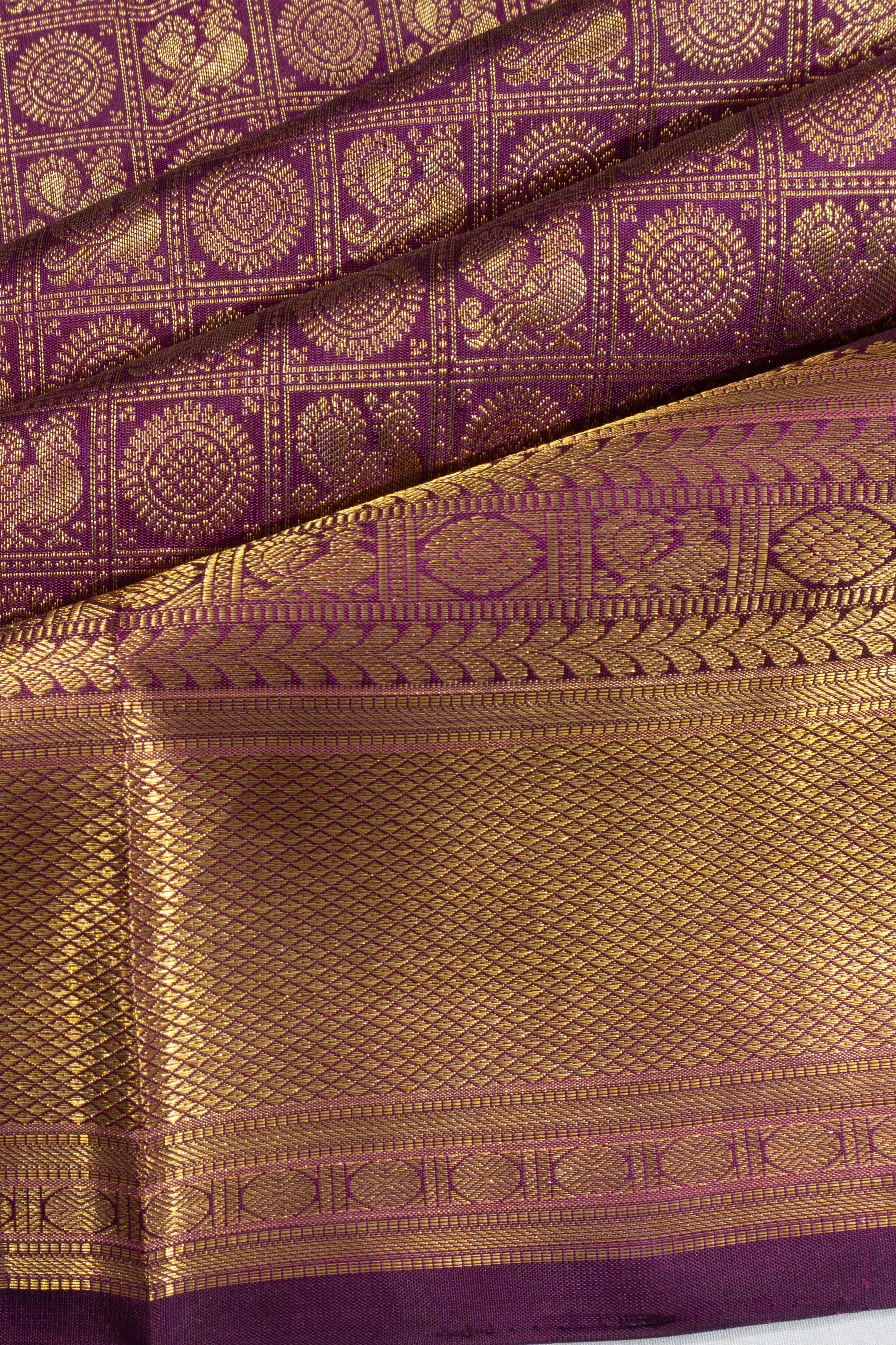 Kanchipuram Silk Checks And Butta Purple Saree