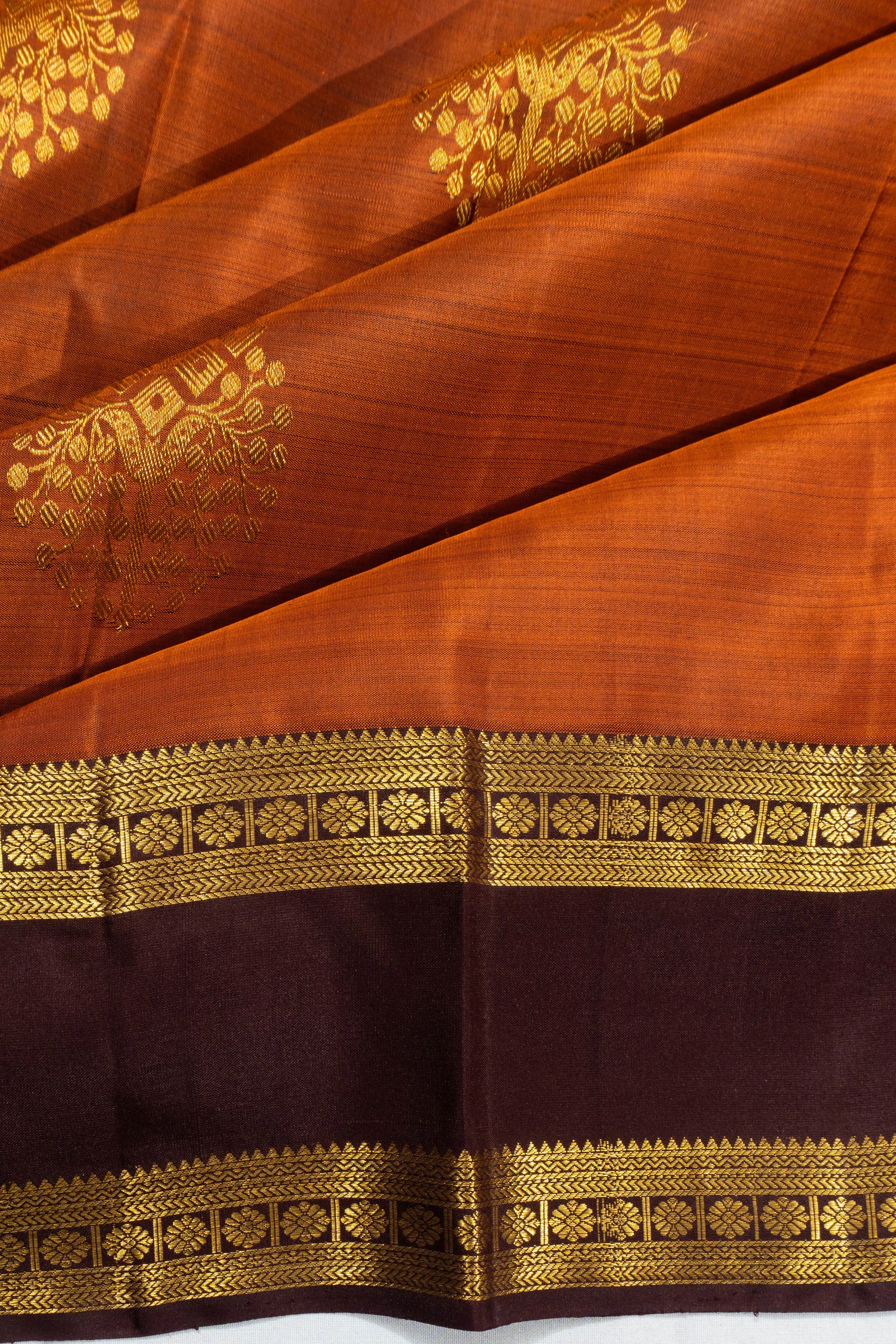 Kanchipuram Silk Butta Rust Orange Saree With Rettai Pettu Border