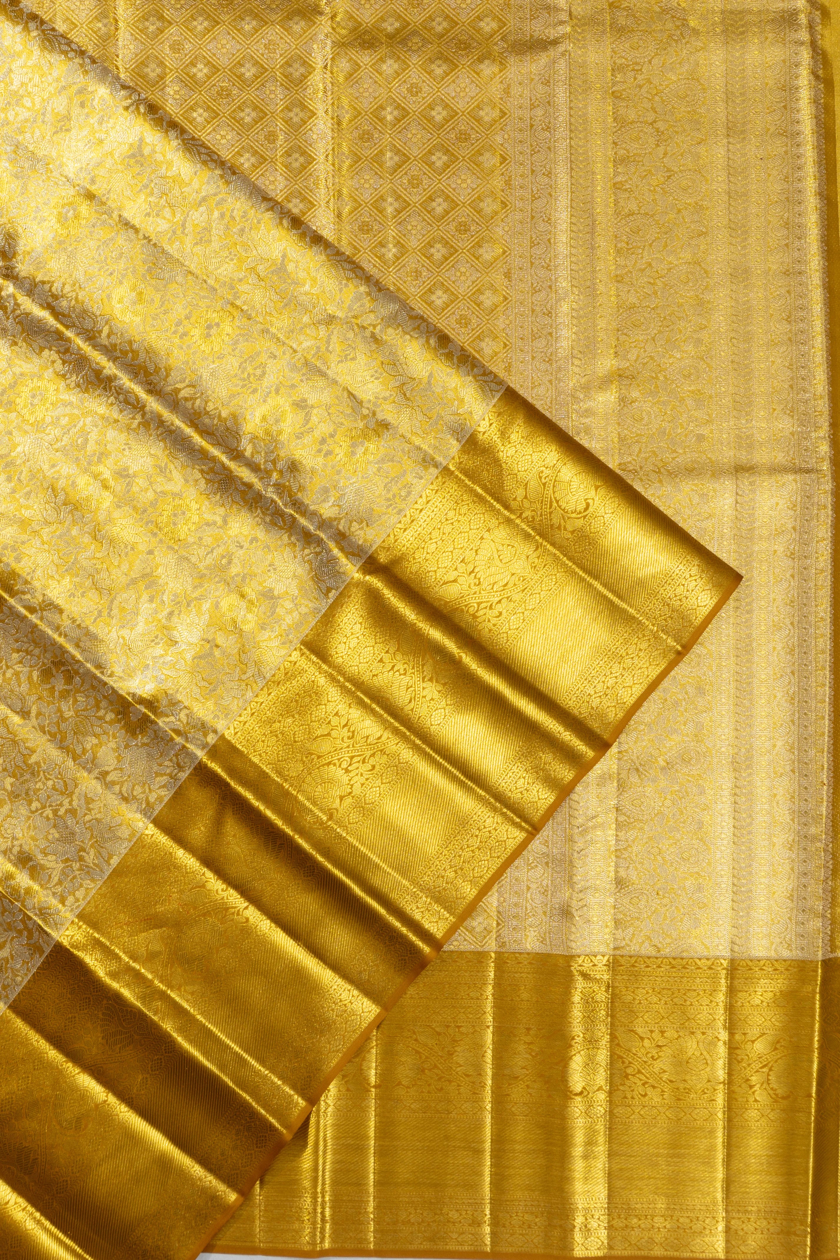 Taranga Kanchi Silk Tissue Brocade Gold Saree