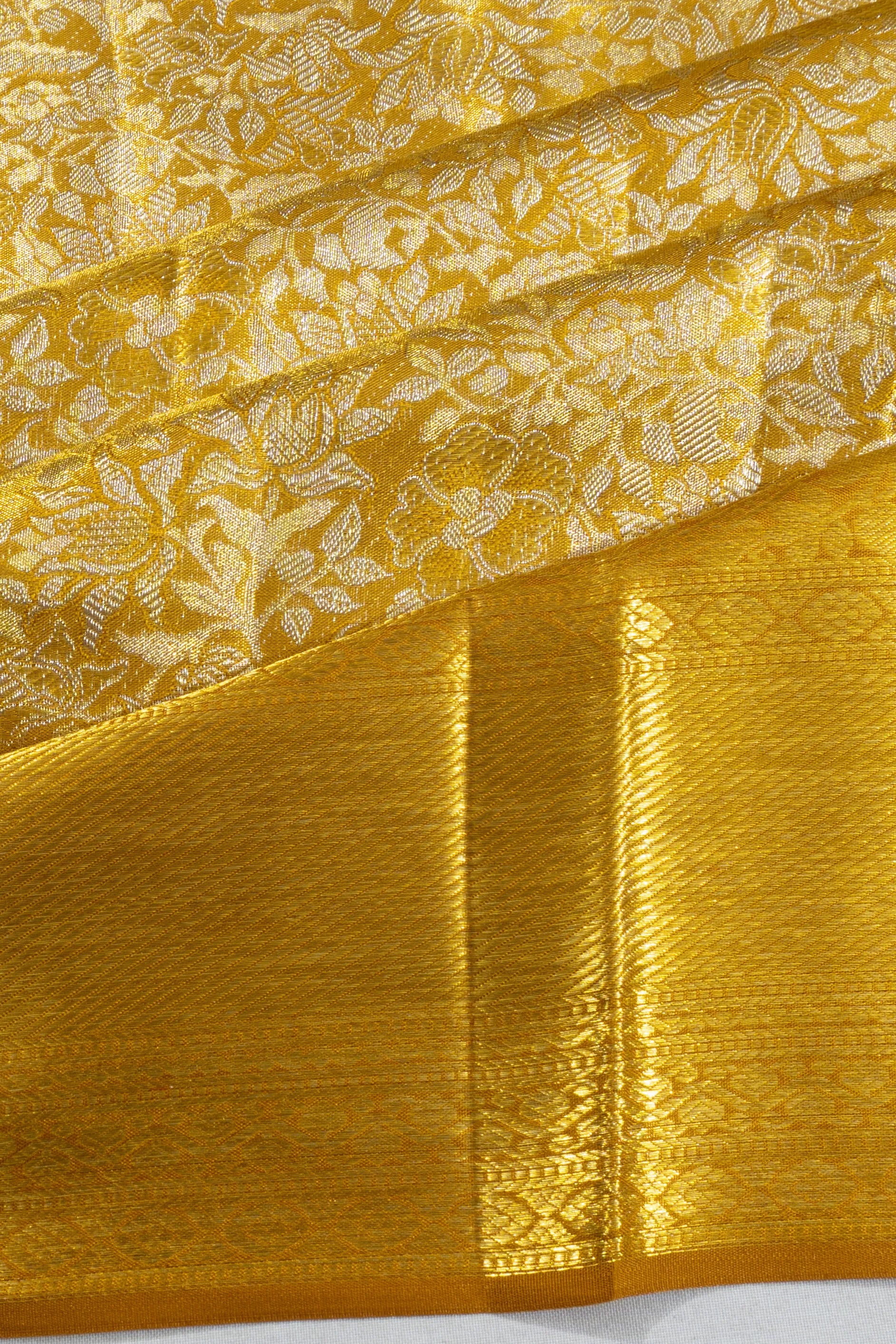 Taranga Kanchi Silk Tissue Brocade Gold Saree