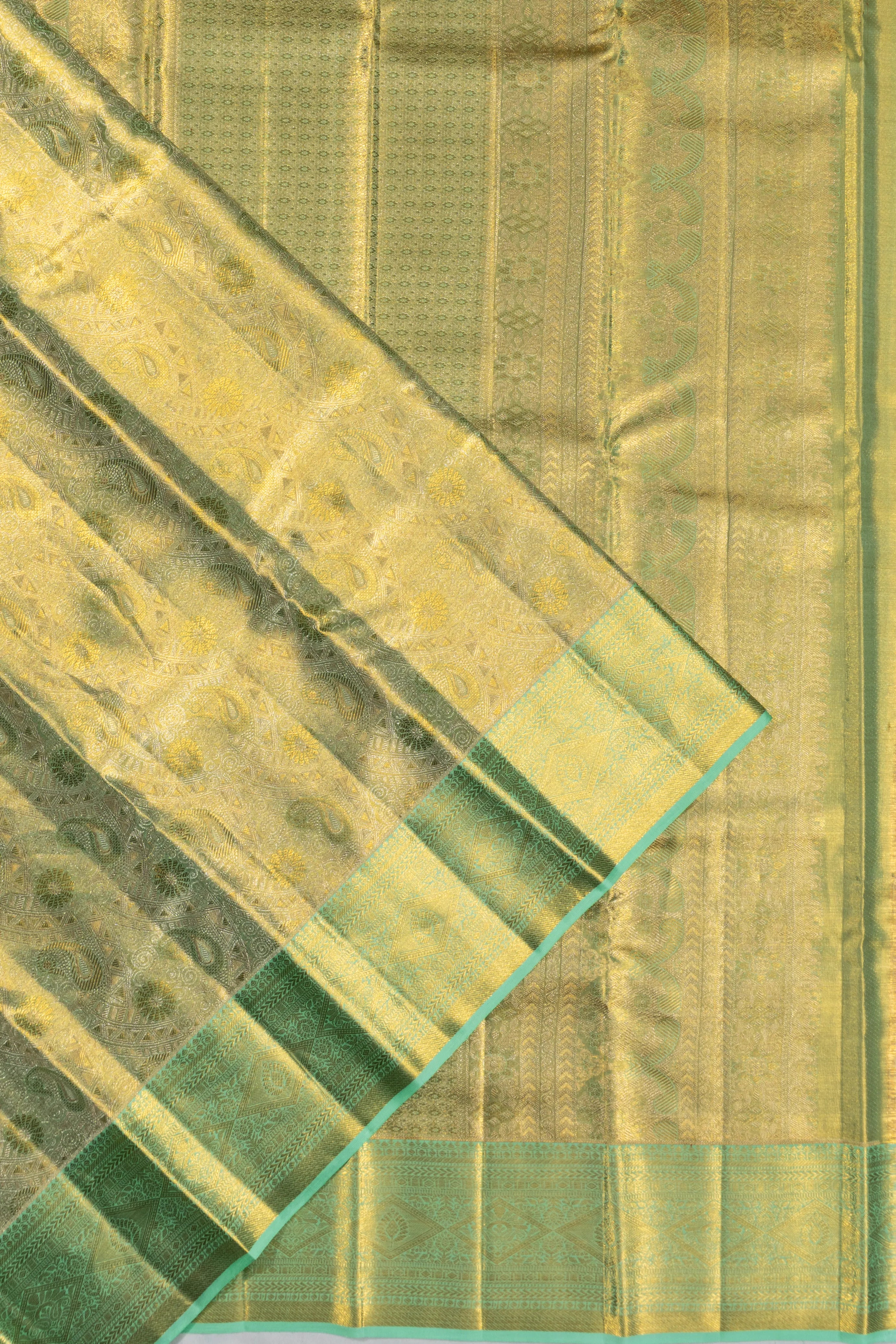 Taranga Kanchi Silk Tissue Brocade Green Saree